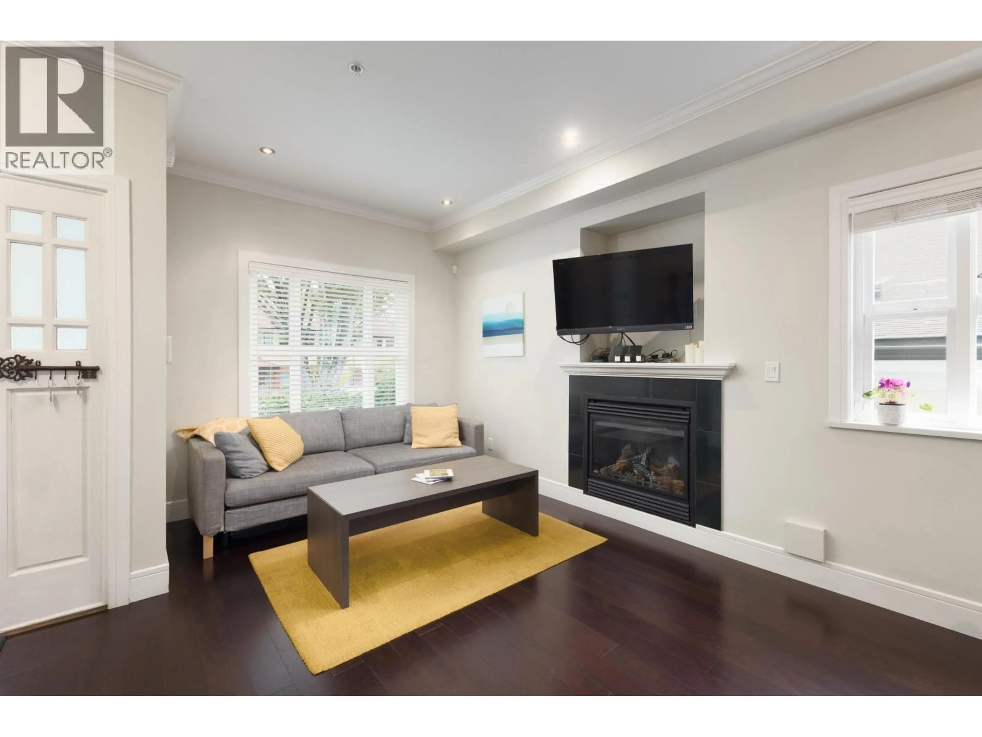 Living room with furniture, wood/laminate floor for 1288 24TH AVENUE, Vancouver British Columbia V5V2B5