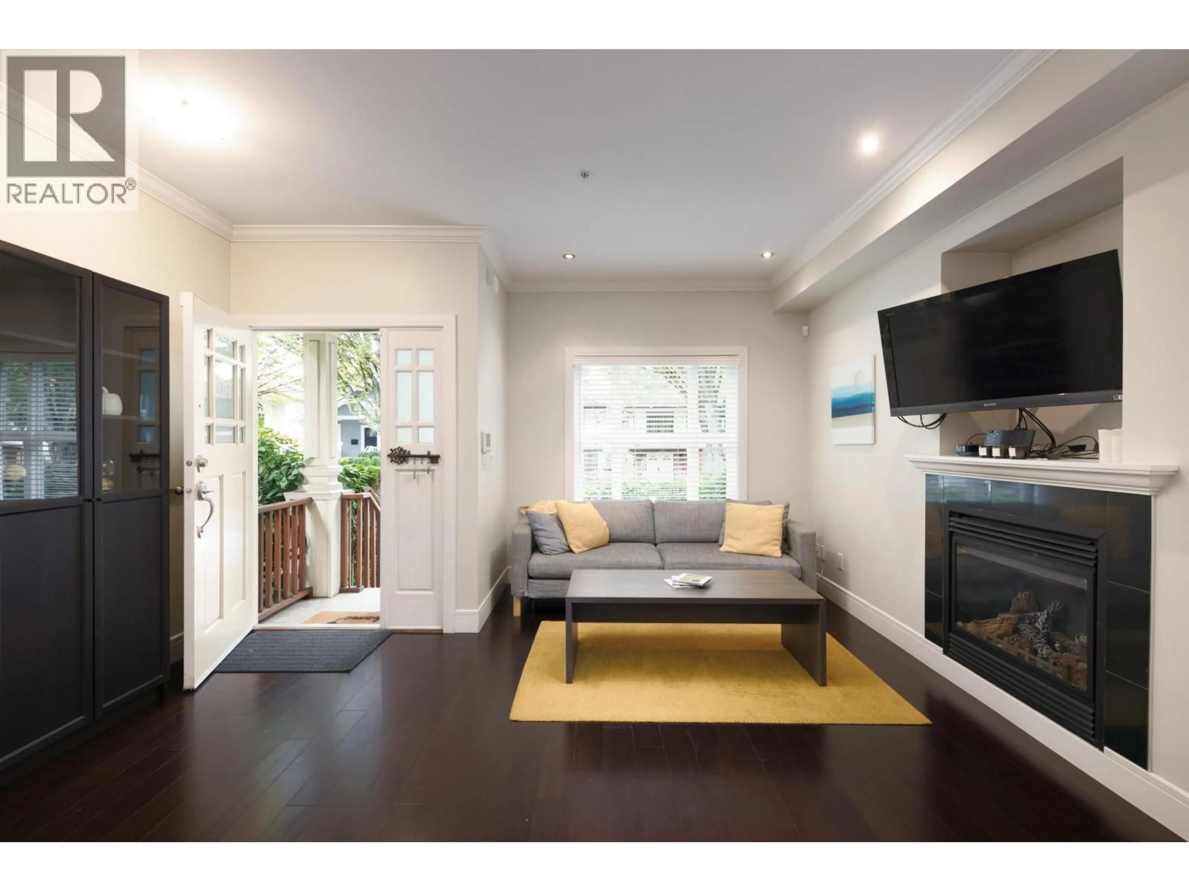 Living room with furniture, wood/laminate floor for 1288 24TH AVENUE, Vancouver British Columbia V5V2B5