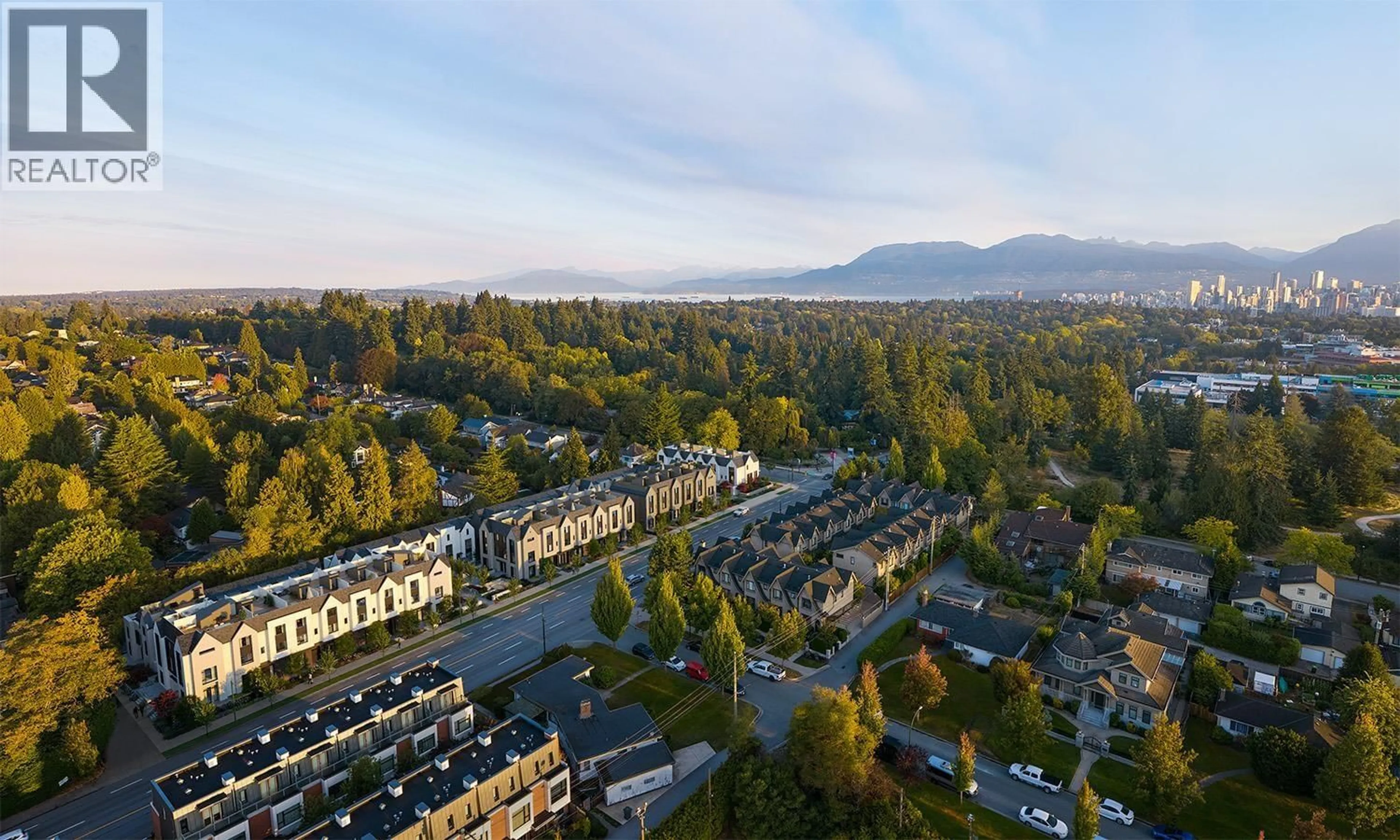 A pic from outside/outdoor area/front of a property/back of a property/a pic from drone, mountain view for 174 - 5431 OAK STREET, Vancouver British Columbia V6M2V5