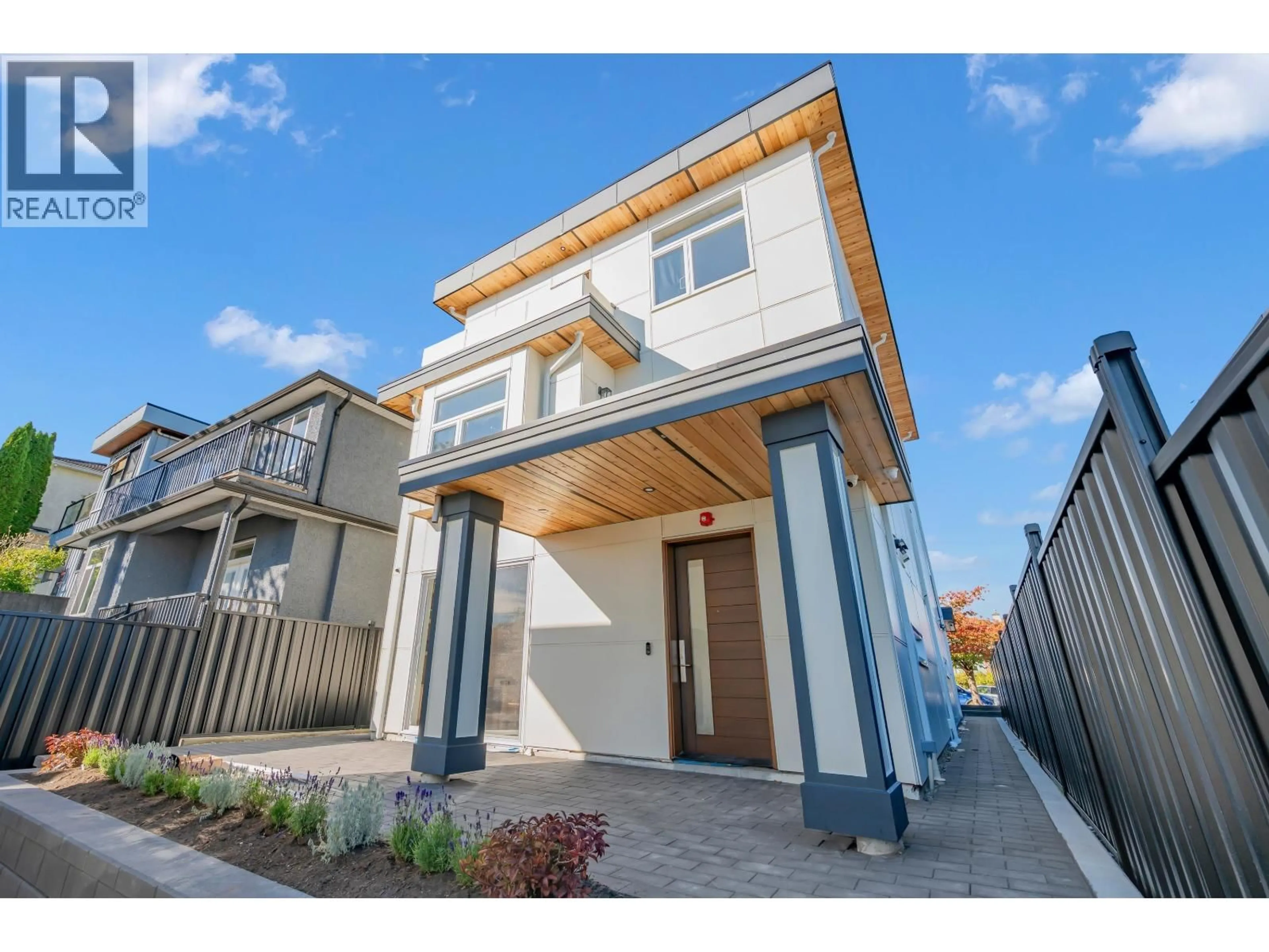Home with vinyl exterior material, street for 2 - 3034 5TH AVENUE, Vancouver British Columbia V5M1N8