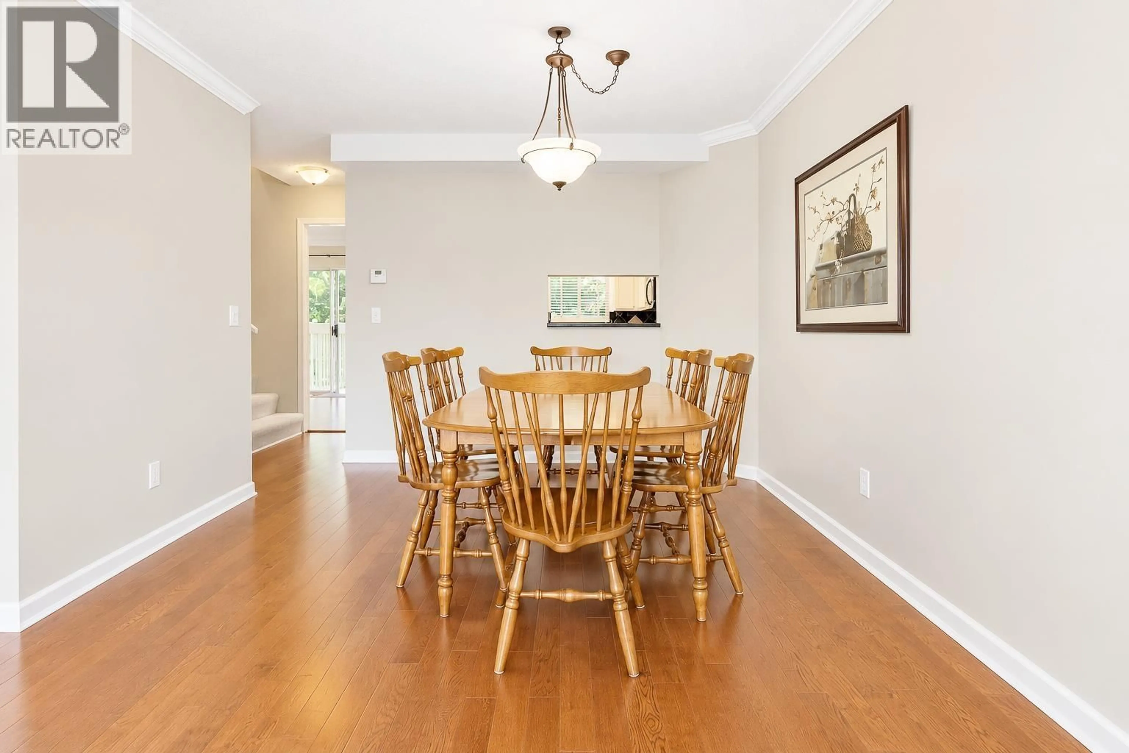Dining room, wood/laminate floor for 202 - 1140 CASTLE CRESCENT, Port Coquitlam British Columbia V3C5R6