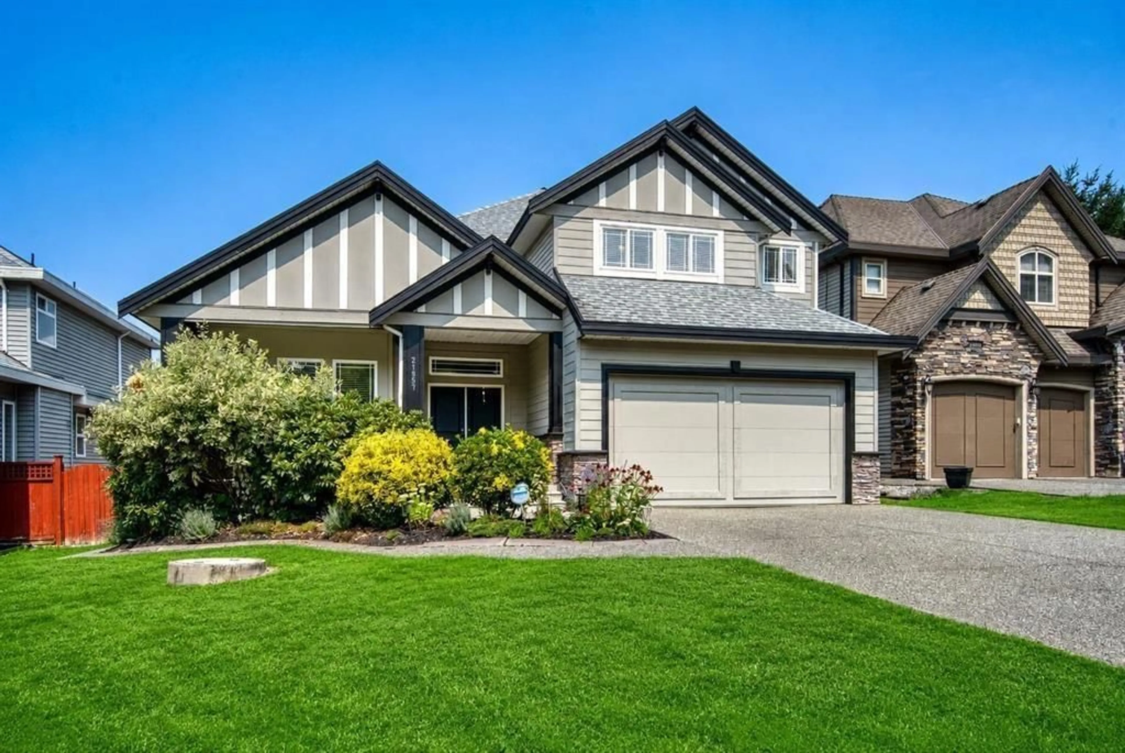 Home with vinyl exterior material, street for 21857 51 AVENUE, Langley British Columbia V3A8P7