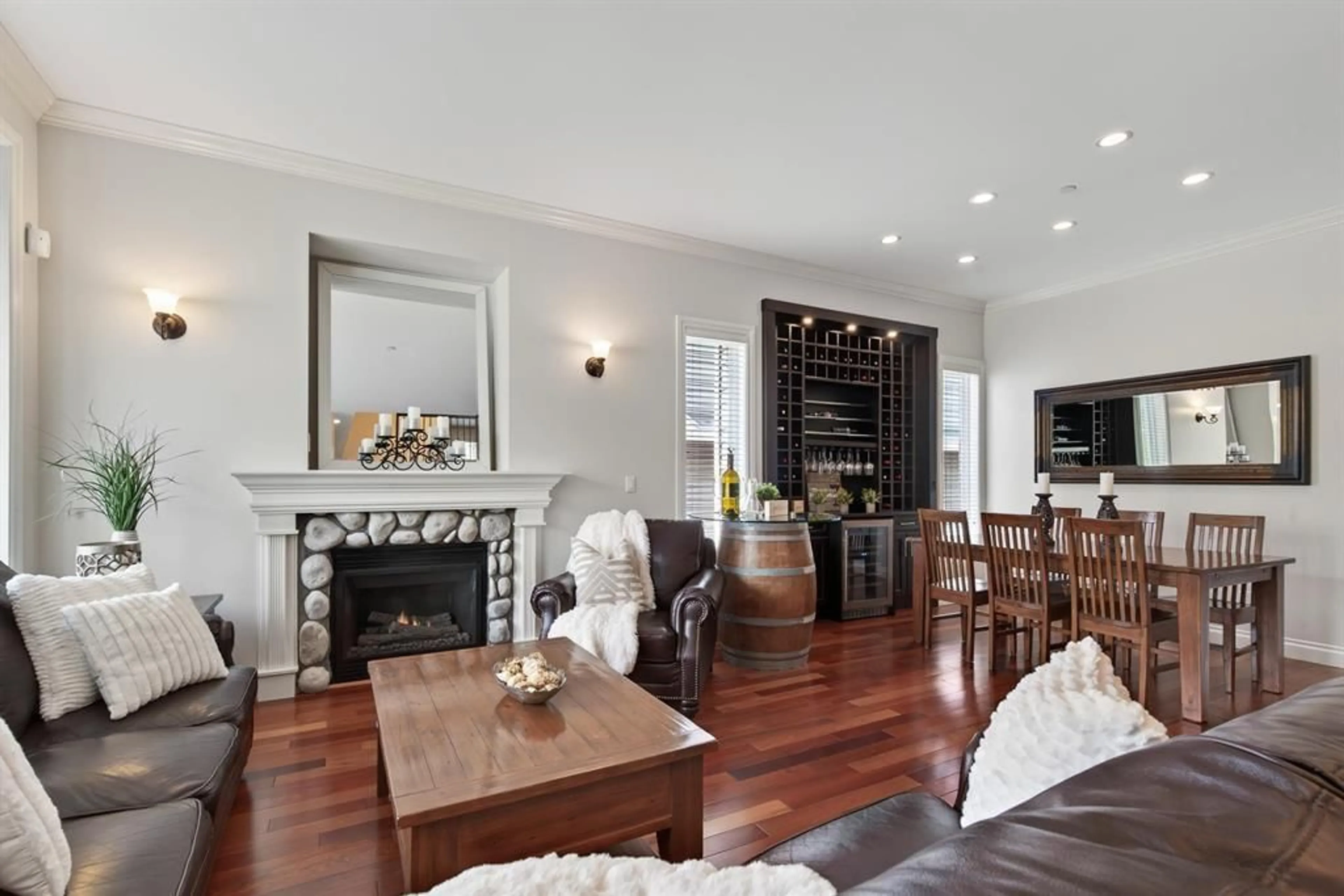 Living room with furniture, wood/laminate floor for 21857 51 AVENUE, Langley British Columbia V3A8P7