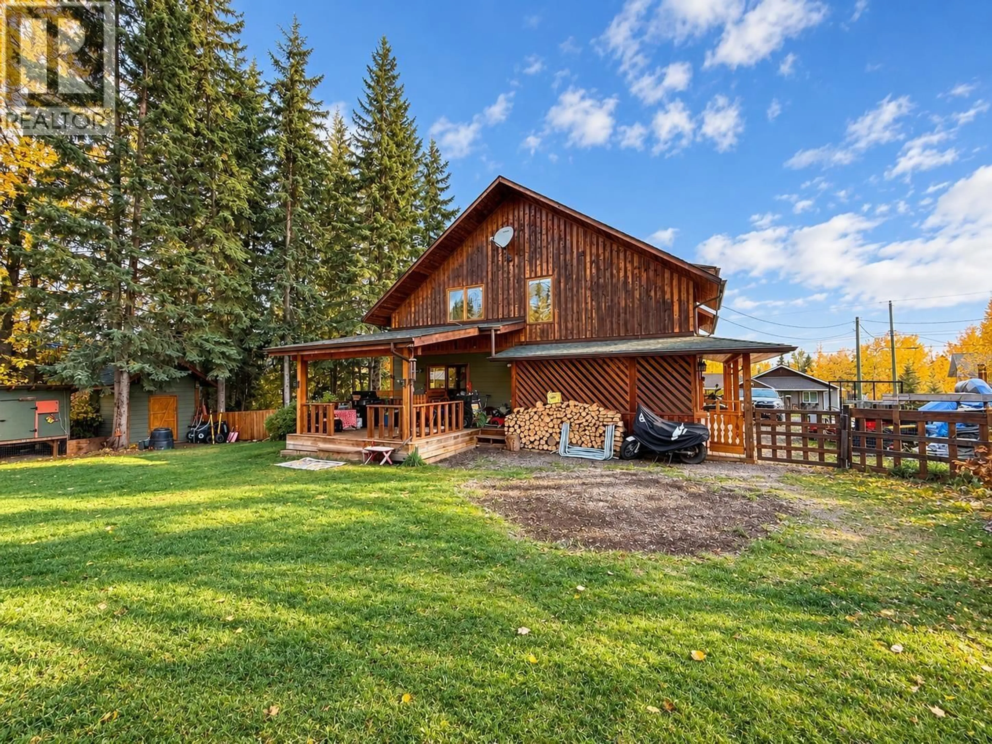 A pic from outside/outdoor area/front of a property/back of a property/a pic from drone, mountain view for 1469 CHESTNUT STREET, Telkwa British Columbia V0J2X0