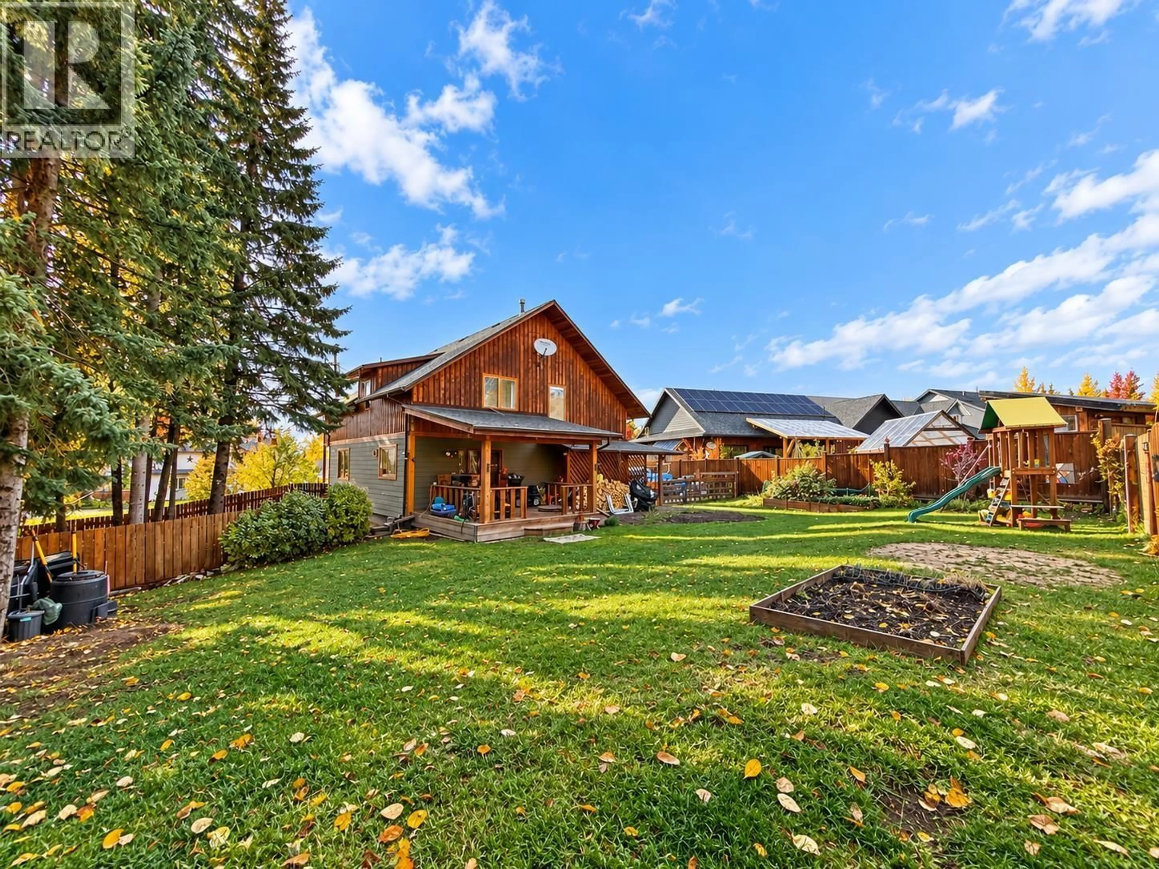 A pic from outside/outdoor area/front of a property/back of a property/a pic from drone, mountain view for 1469 CHESTNUT STREET, Telkwa British Columbia V0J2X0