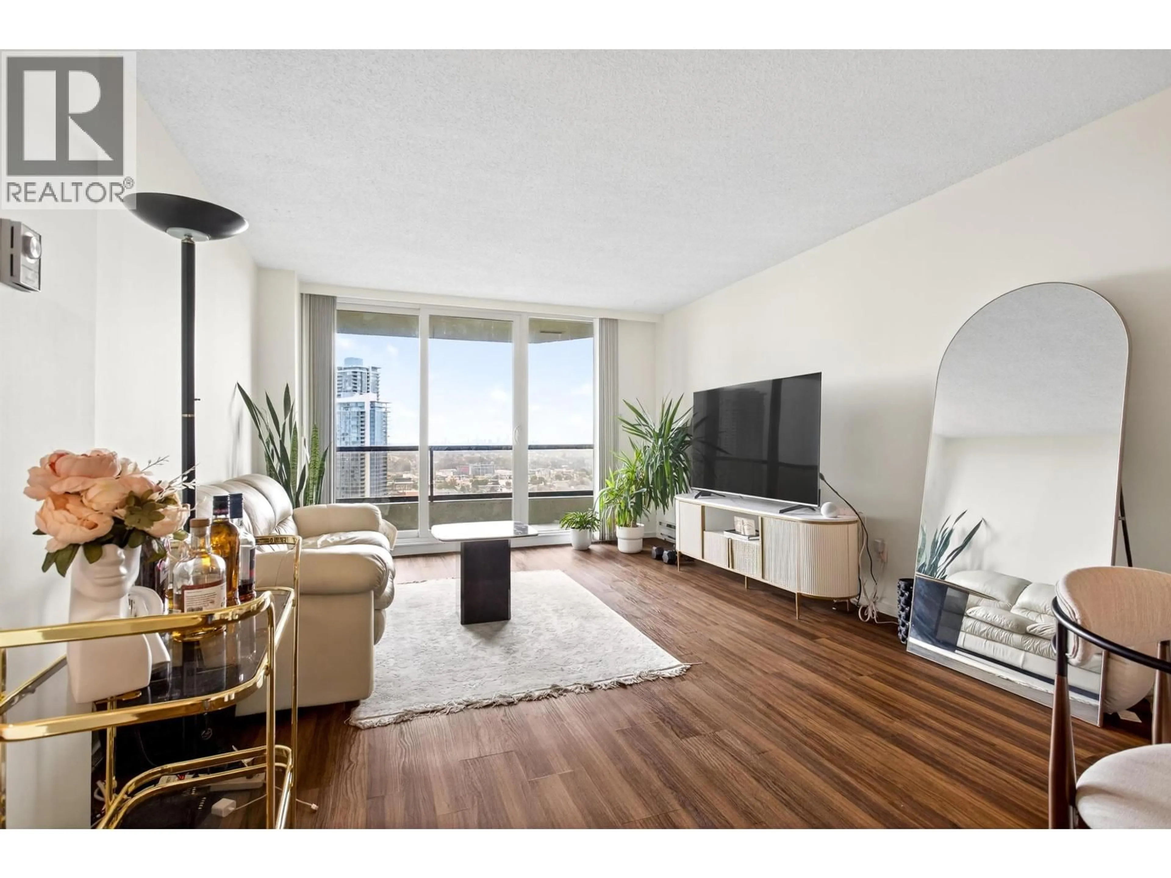 Living room with furniture, wood/laminate floor for 2308 - 4353 HALIFAX STREET, Burnaby British Columbia V5C5Z4