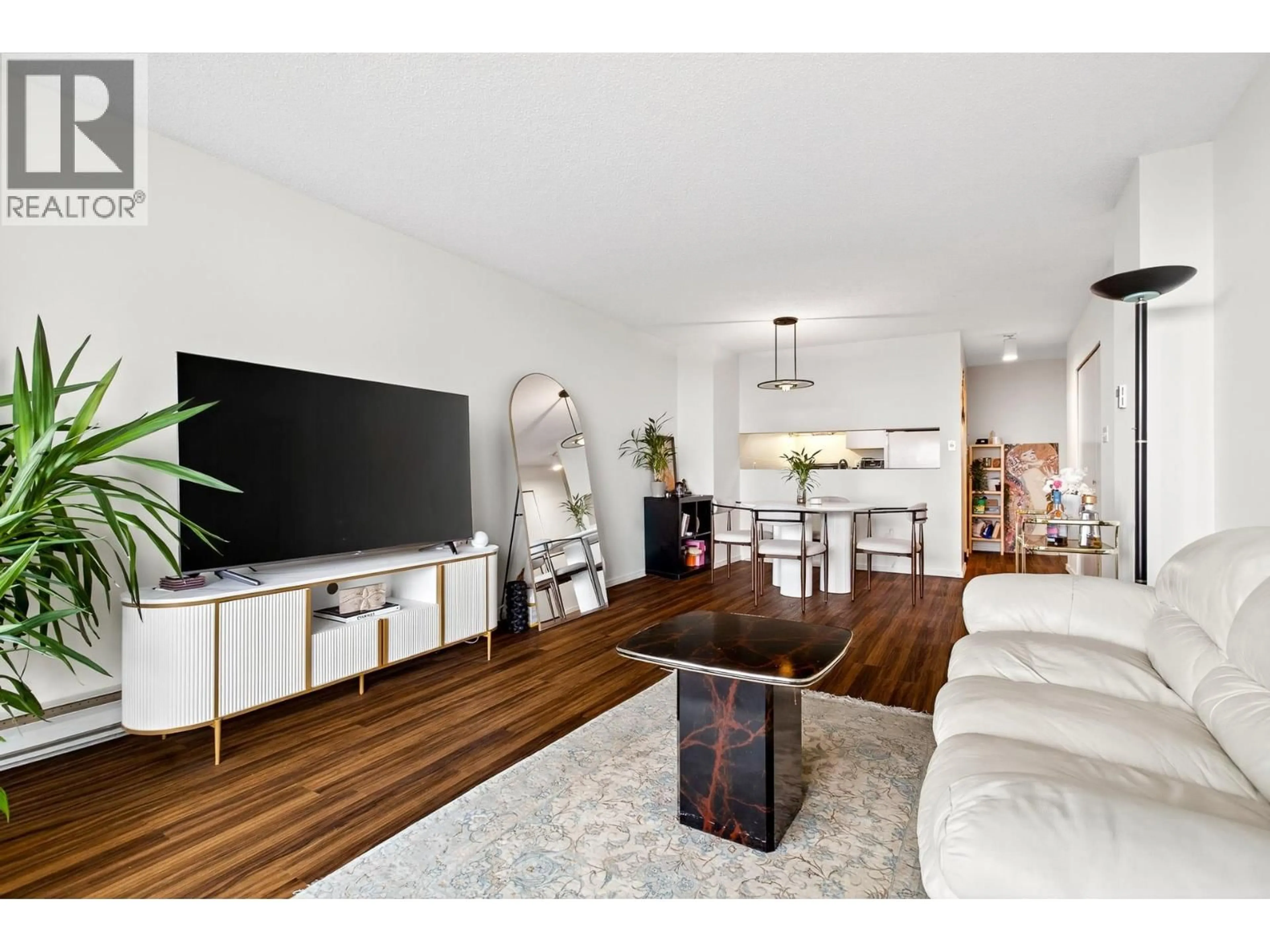 Living room with furniture, wood/laminate floor for 2308 - 4353 HALIFAX STREET, Burnaby British Columbia V5C5Z4