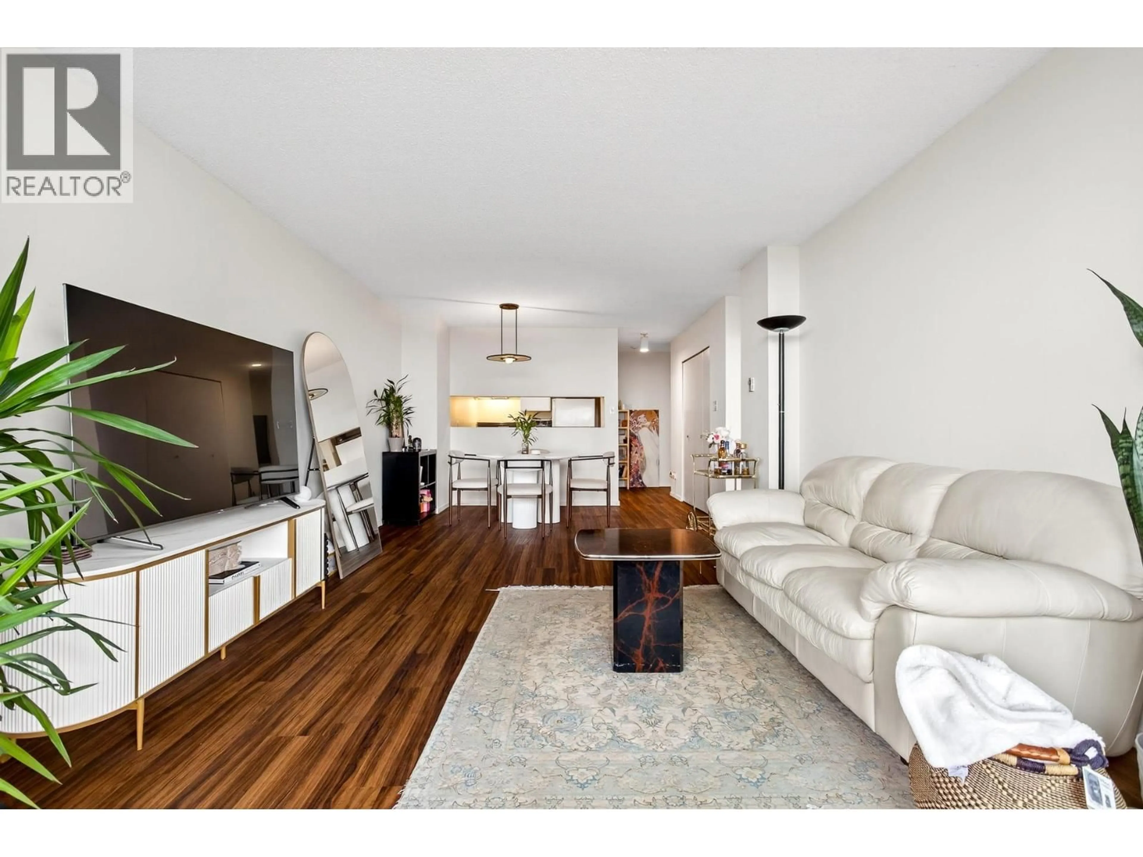 Living room with furniture, wood/laminate floor for 2308 - 4353 HALIFAX STREET, Burnaby British Columbia V5C5Z4