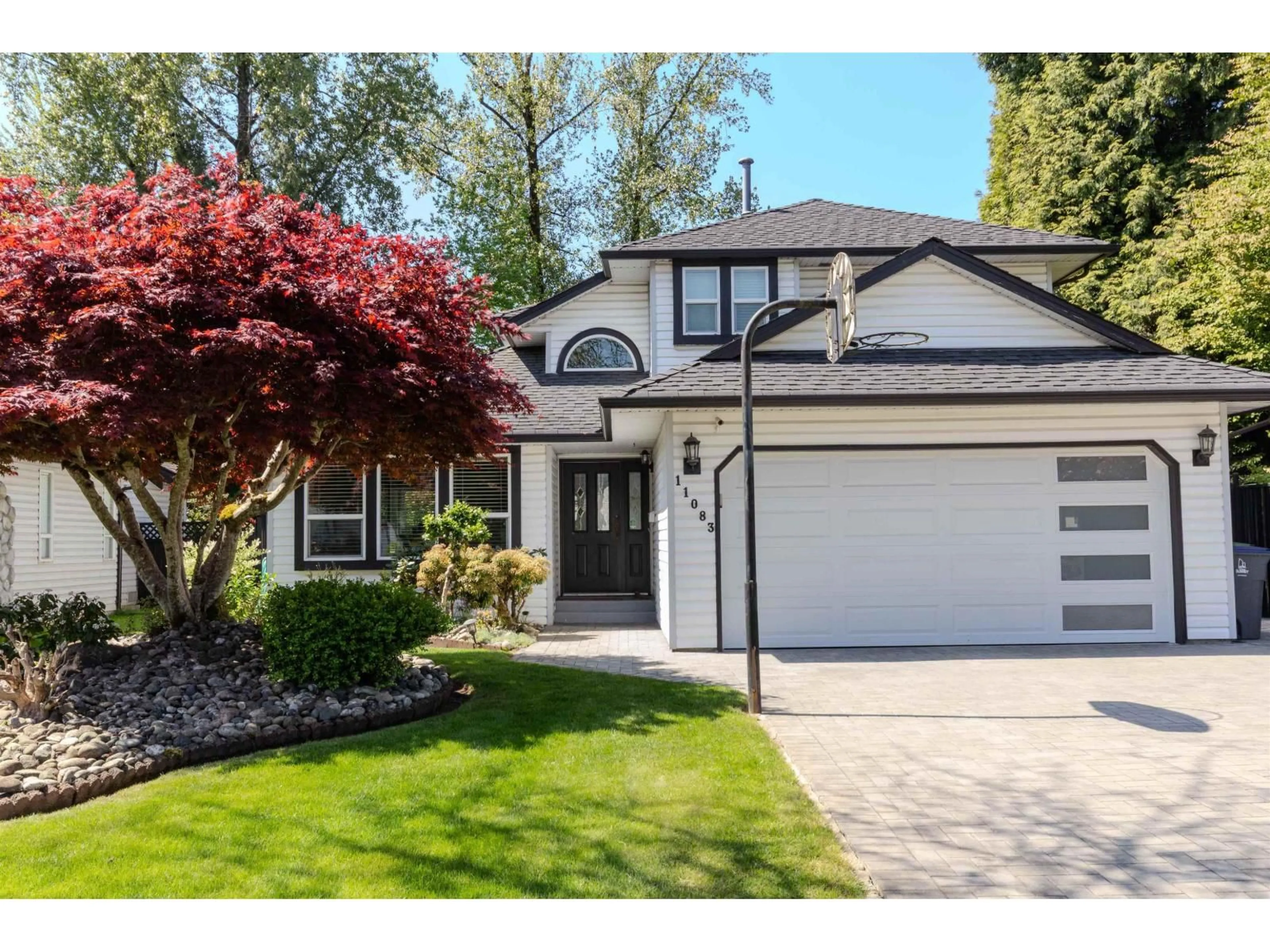 Home with vinyl exterior material, street for 11083 153A STREET, Surrey British Columbia V3R9H8