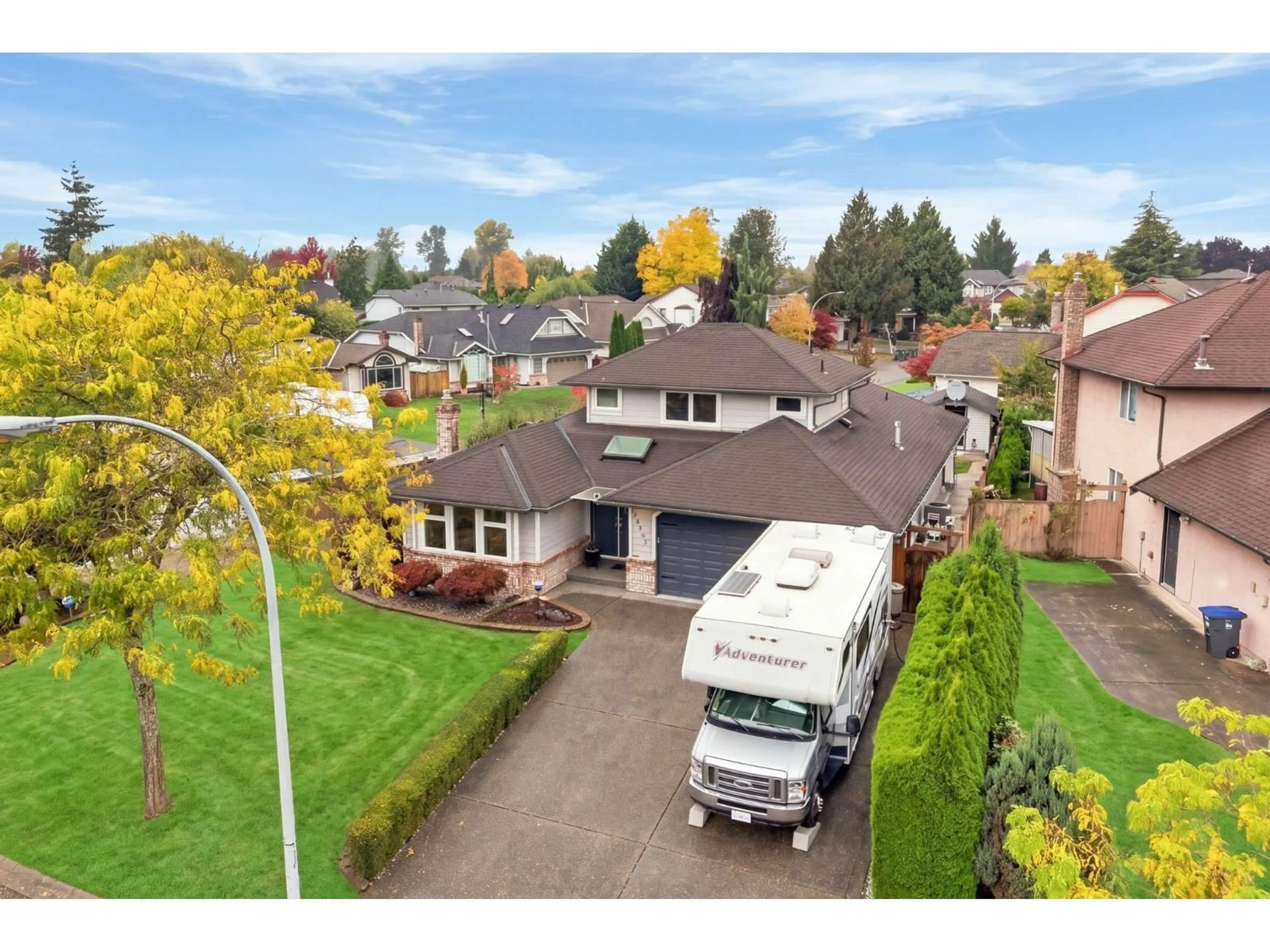 A pic from outside/outdoor area/front of a property/back of a property/a pic from drone, street for 18707 60A AVENUE, Surrey British Columbia V3S7P3