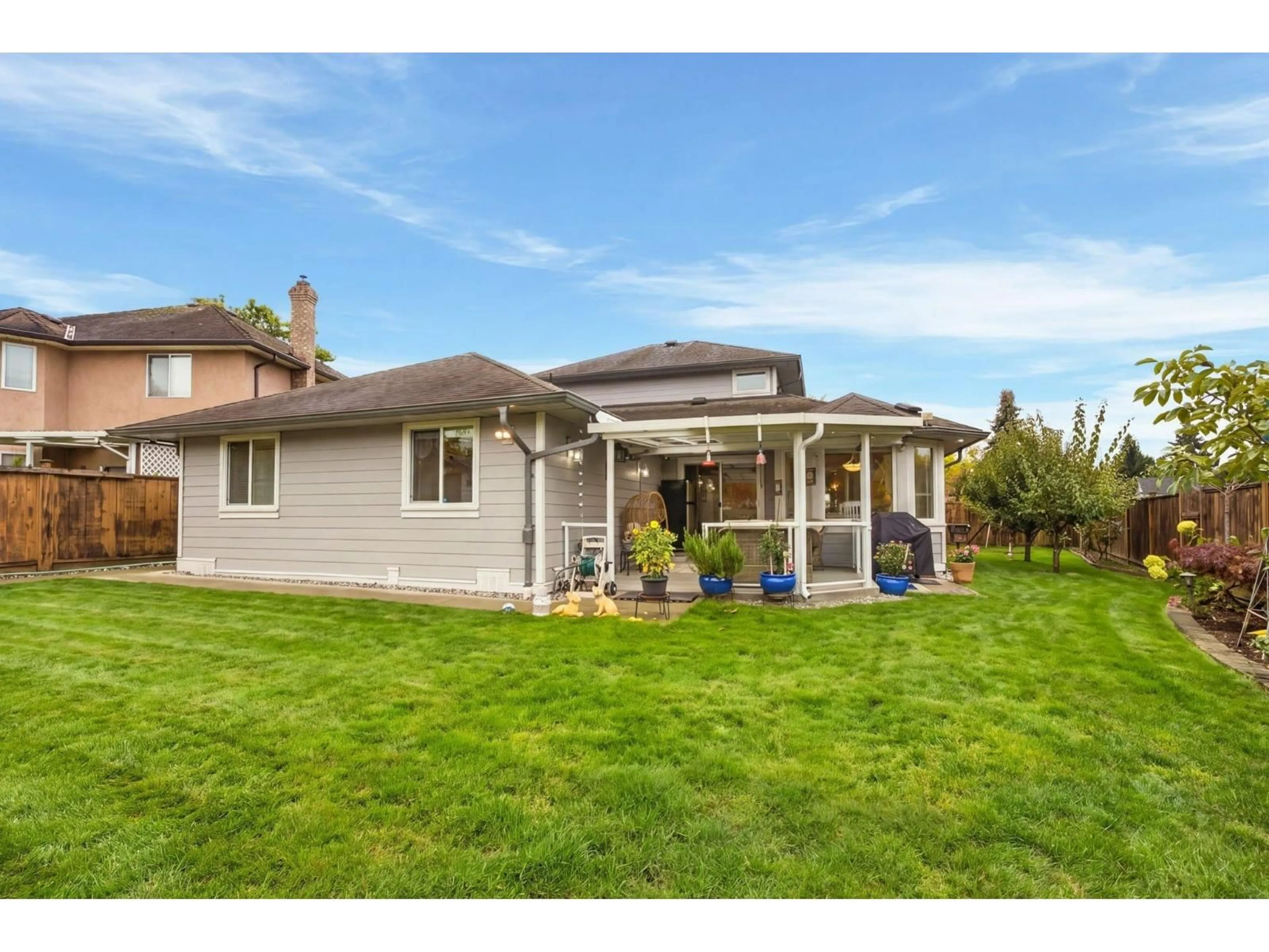 Home with vinyl exterior material, street for 18707 60A AVENUE, Surrey British Columbia V3S7P3
