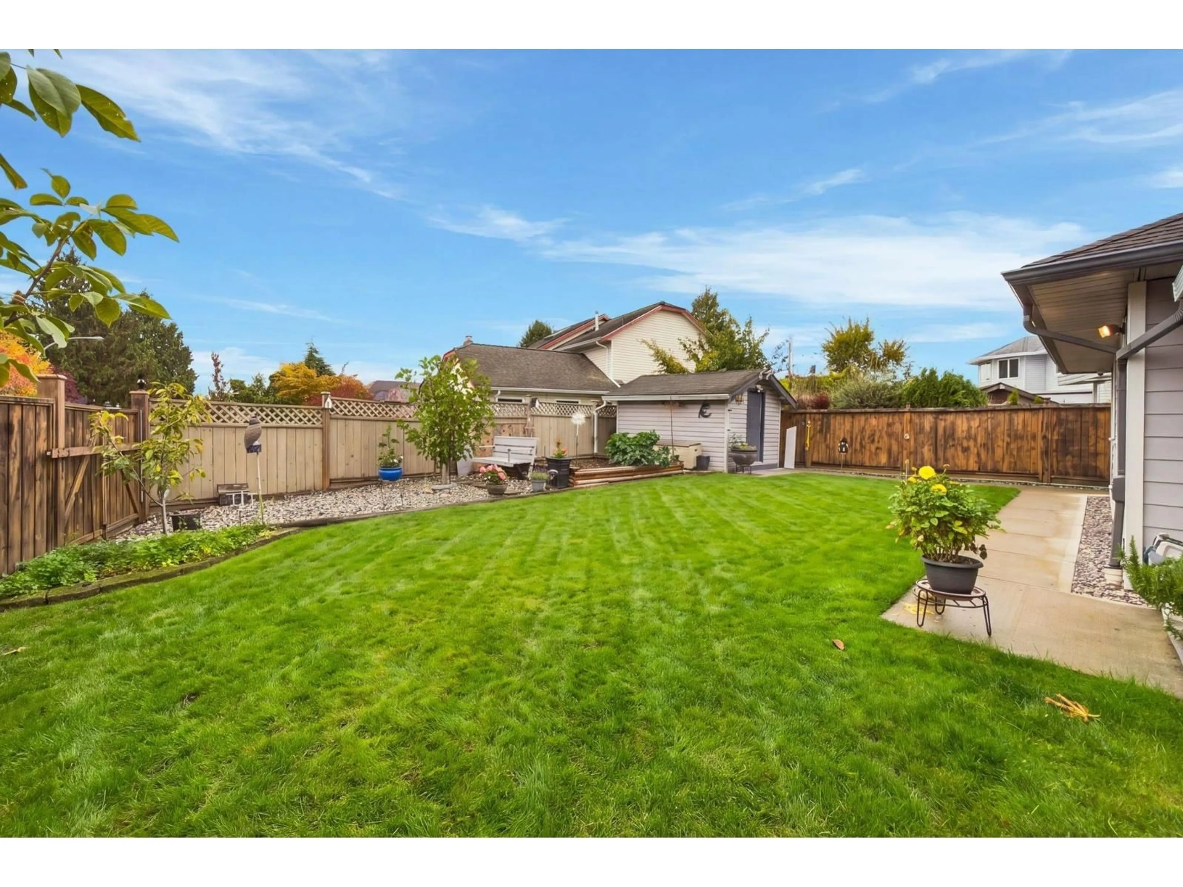 A pic from outside/outdoor area/front of a property/back of a property/a pic from drone, street for 18707 60A AVENUE, Surrey British Columbia V3S7P3