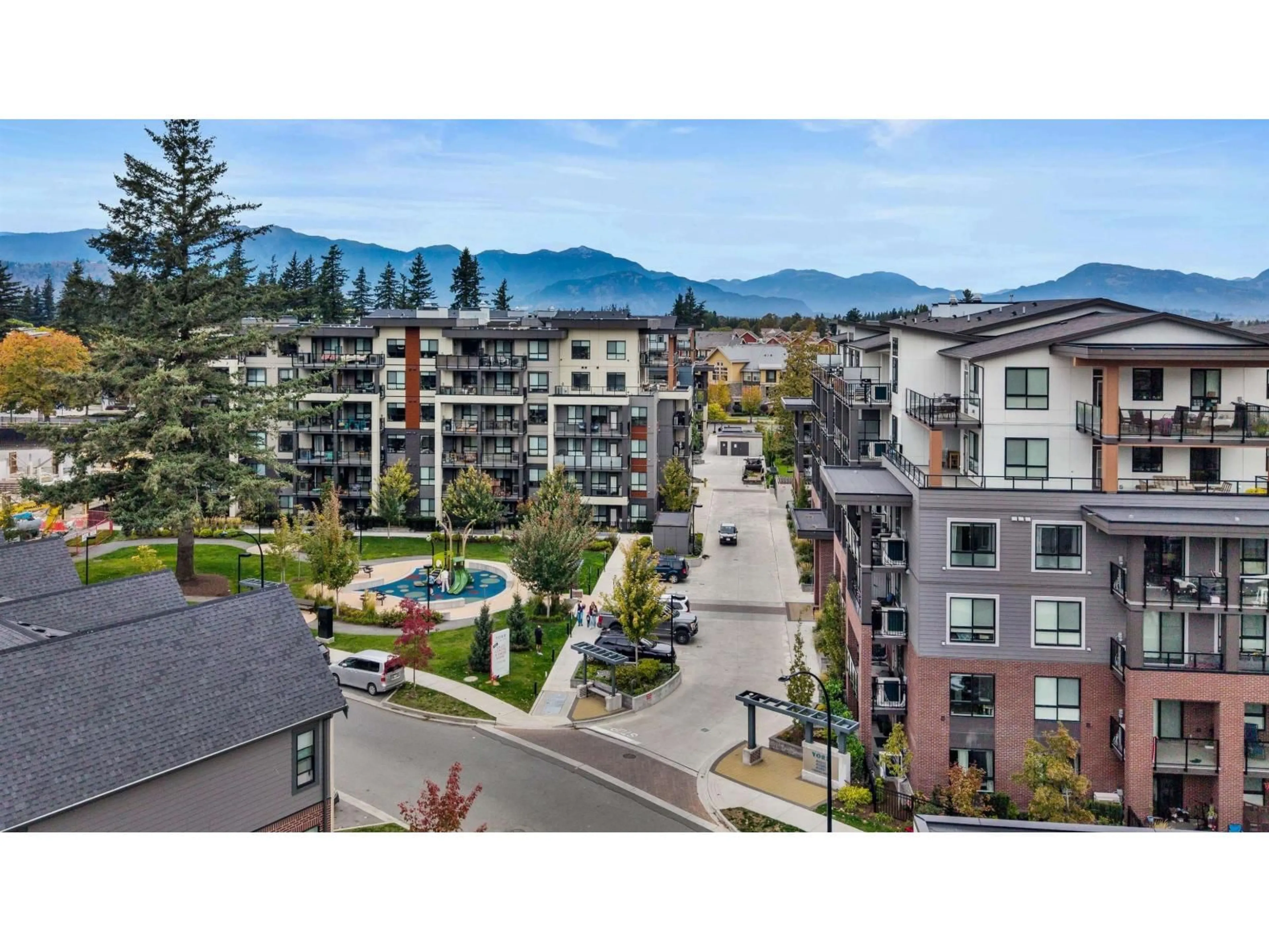 A pic from outside/outdoor area/front of a property/back of a property/a pic from drone, mountain view for 307 - 45511 CAMPUS DRIVE, Chilliwack British Columbia V2R6K8