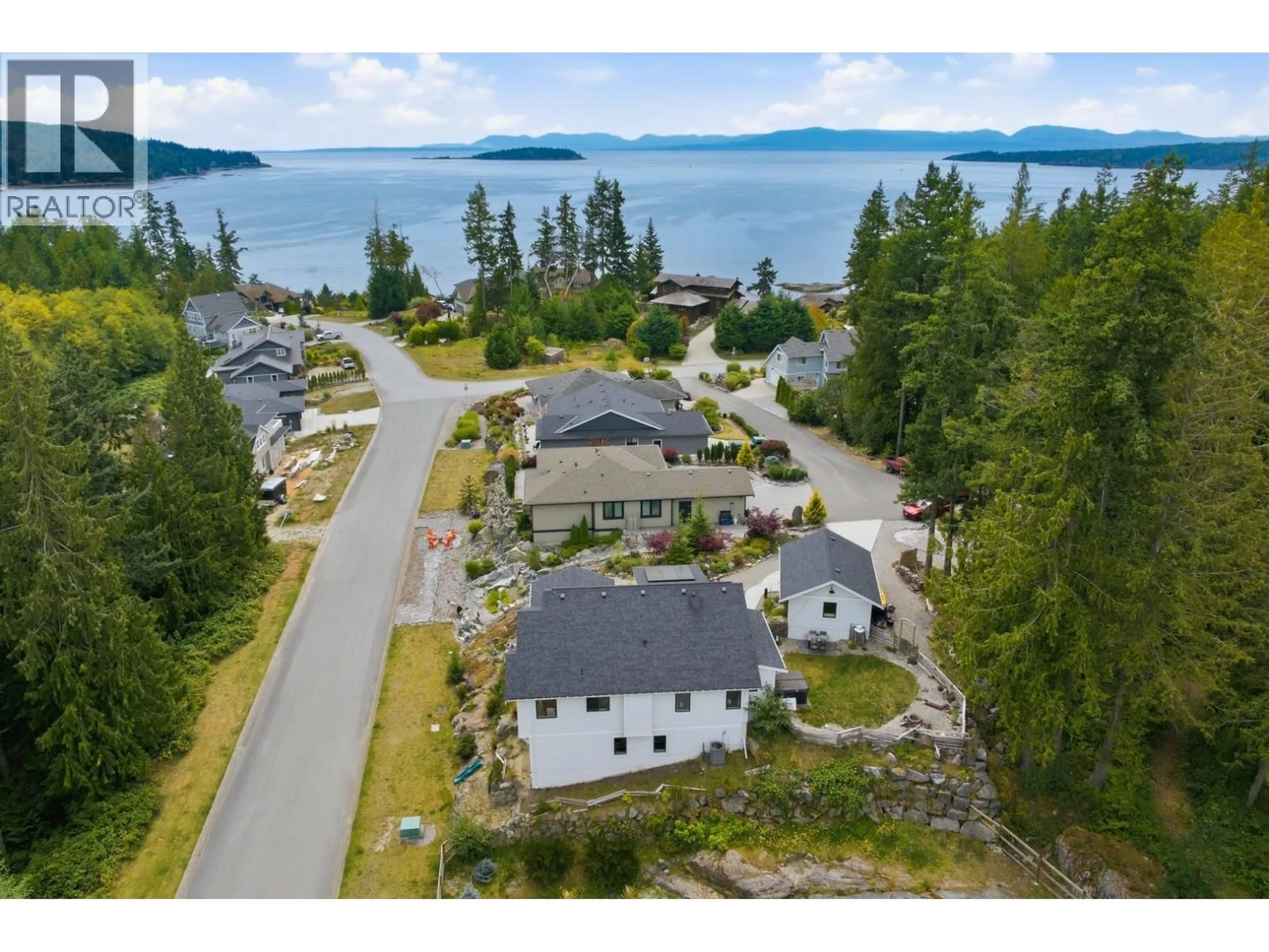 A pic from outside/outdoor area/front of a property/back of a property/a pic from drone, water/lake/river/ocean view for 9336 JORGENSEN PLACE, Halfmoon Bay British Columbia V7Z1B4