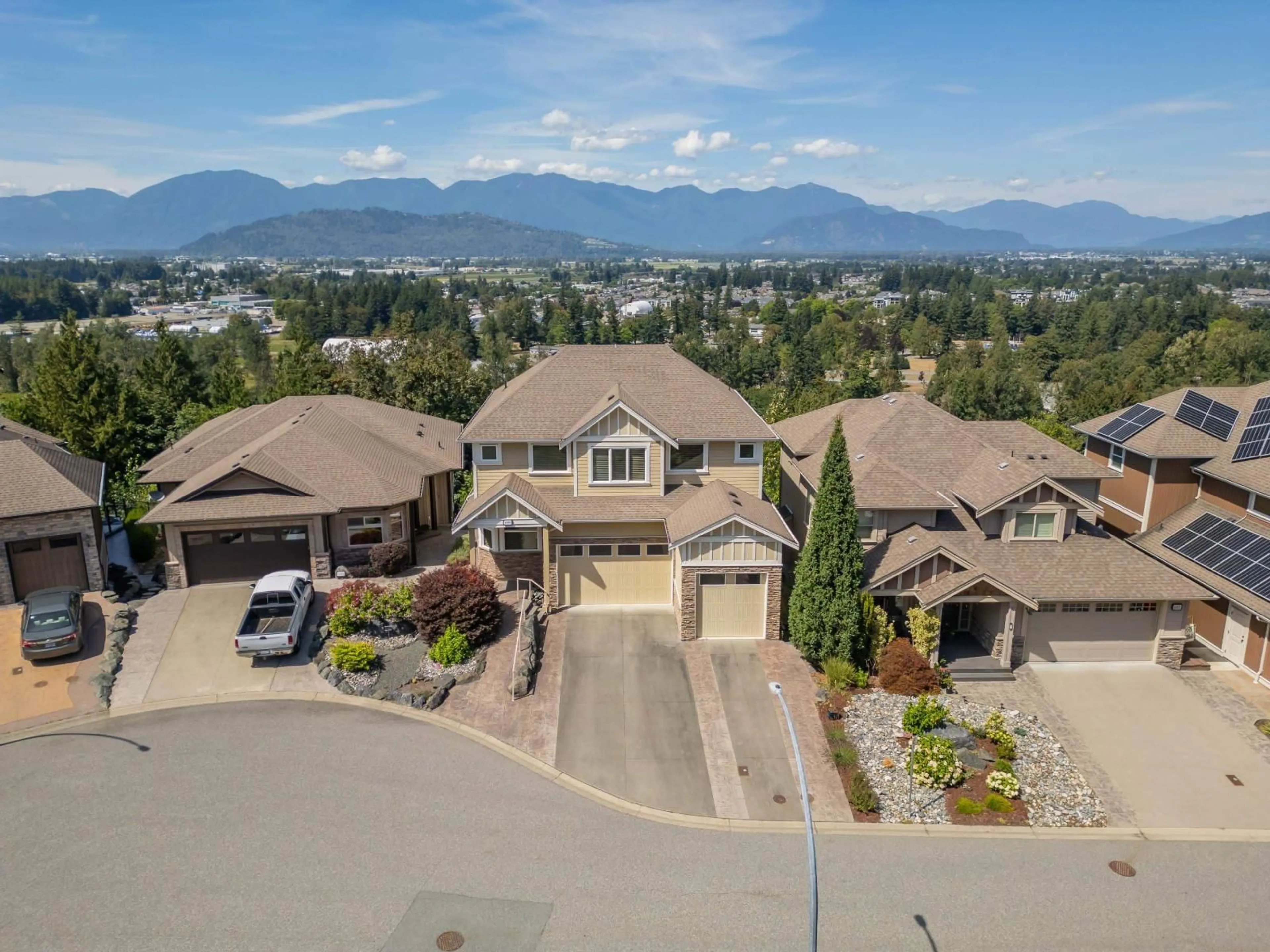 A pic from outside/outdoor area/front of a property/back of a property/a pic from drone, mountain view for 45365 MAGDALENA PLACE, Cultus Lake British Columbia V2R0K7