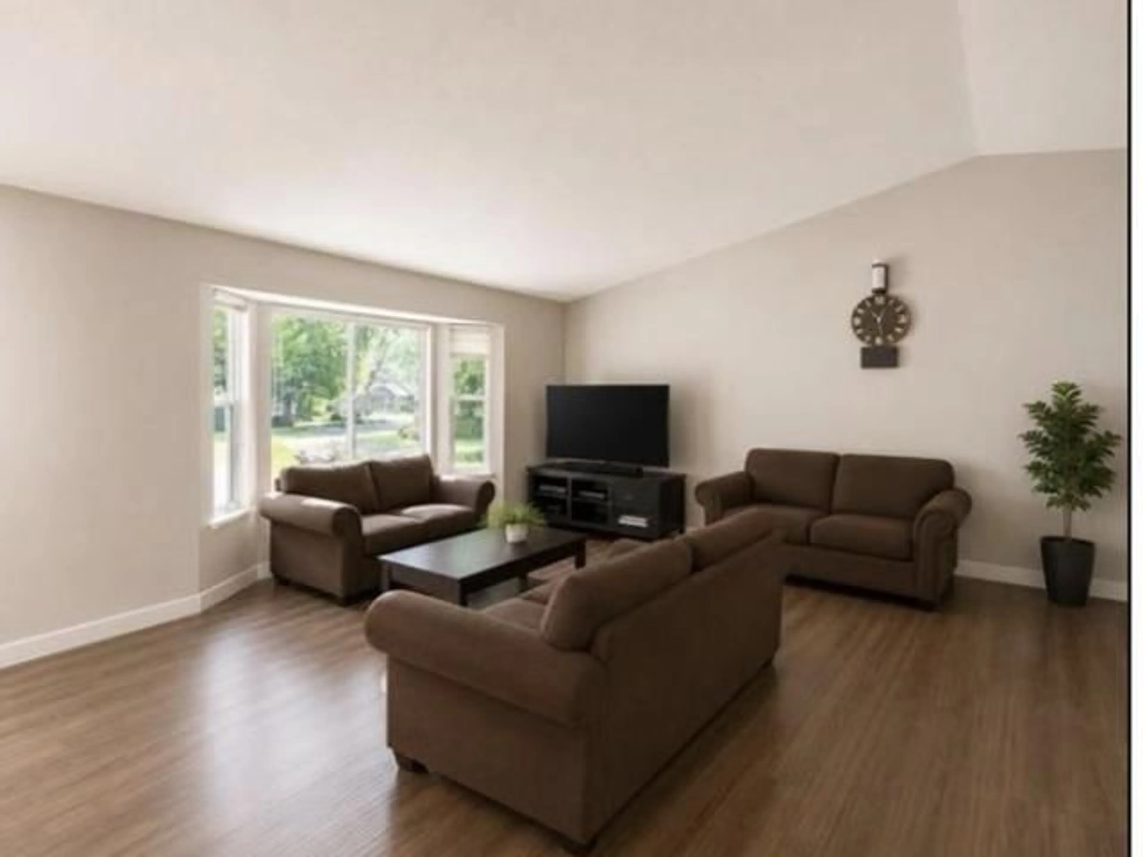 Living room with furniture, wood/laminate floor for 14565 91A AVENUE, Surrey British Columbia V3R7K6