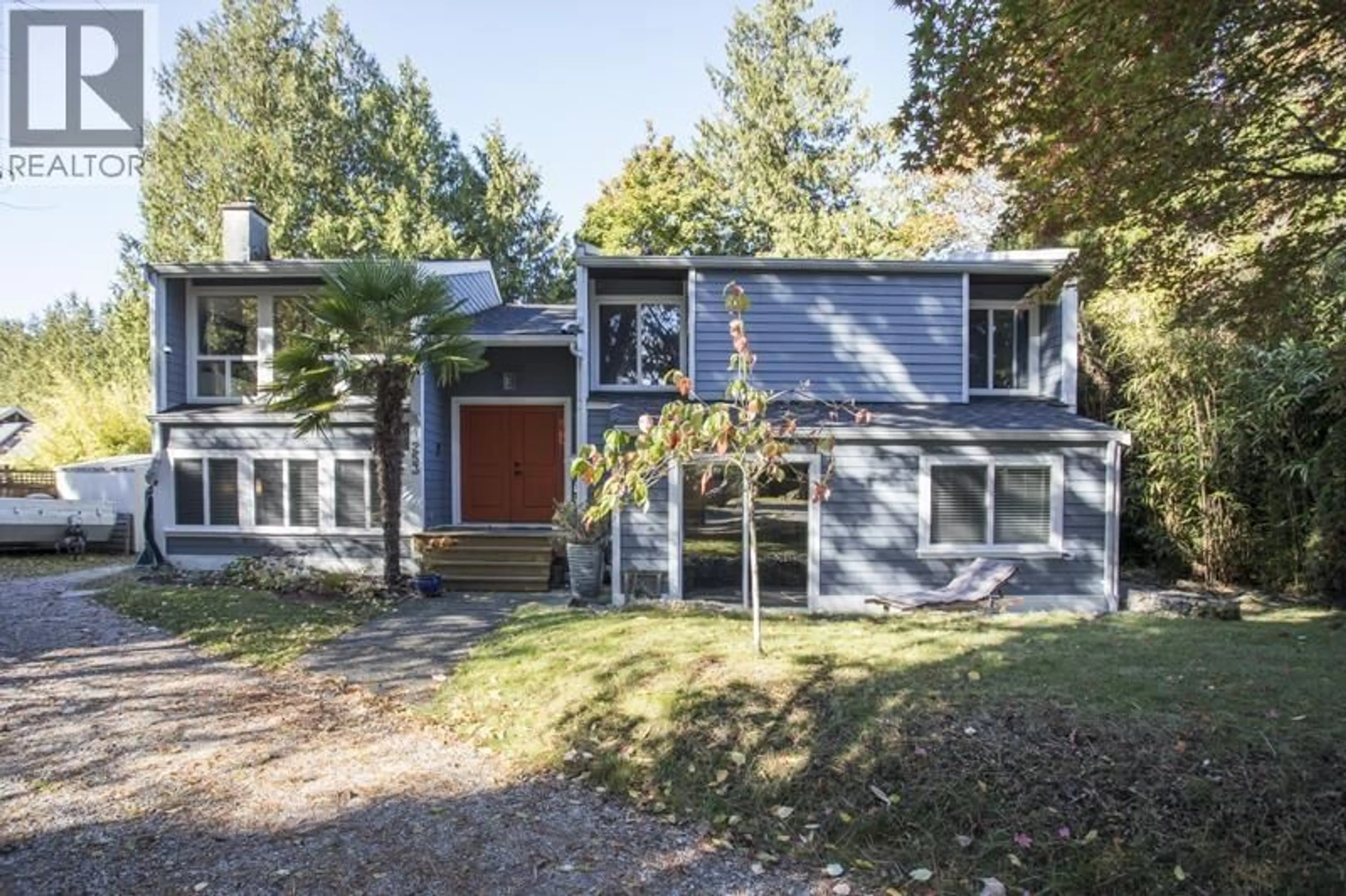 Home with vinyl exterior material, street for 253 49 STREET, Delta British Columbia V4M3N3