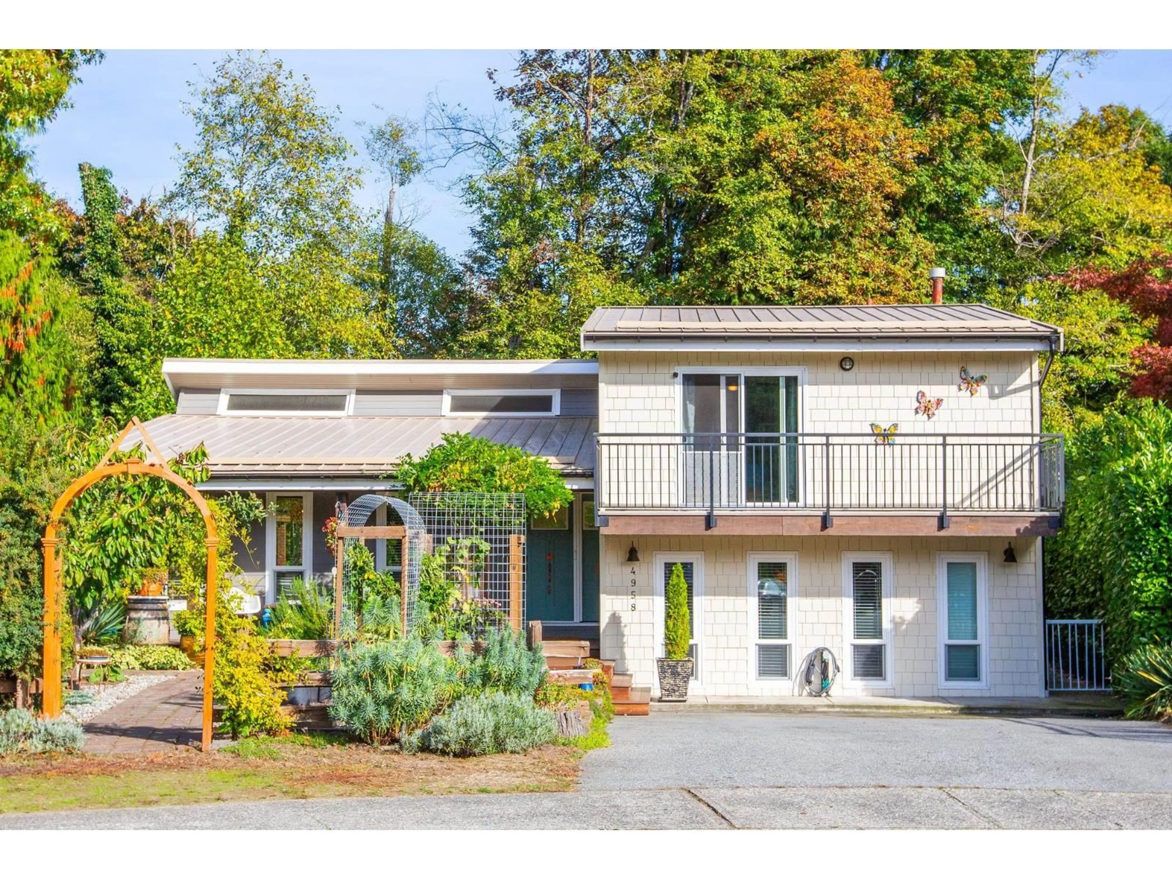Home with vinyl exterior material, street for 4958 198B STREET, Langley British Columbia V3A6L4