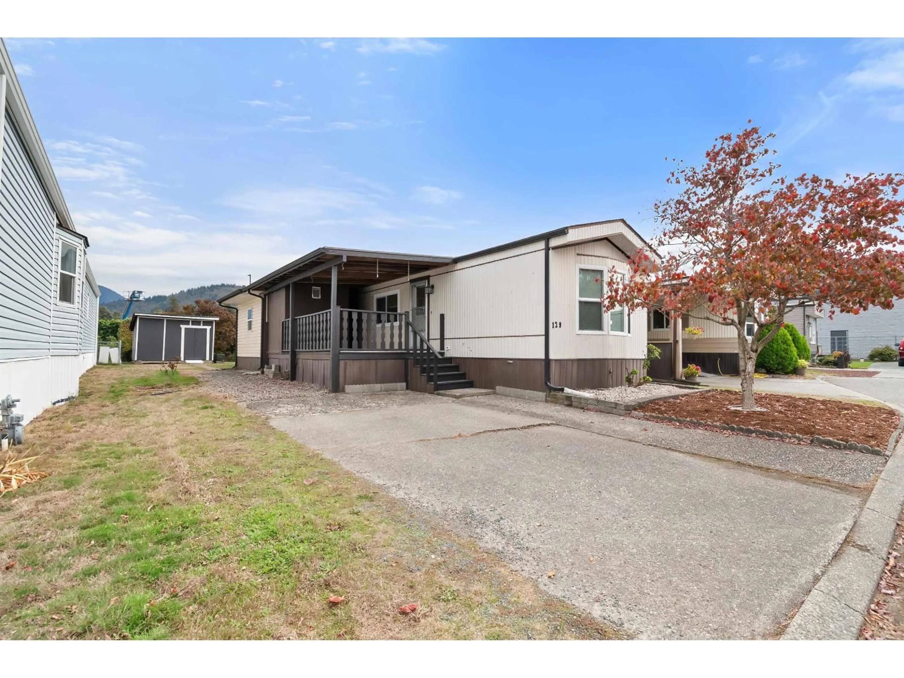 A pic from outside/outdoor area/front of a property/back of a property/a pic from drone, unknown for 129 - 6338 VEDDER ROAD, Chilliwack British Columbia V2R3R4