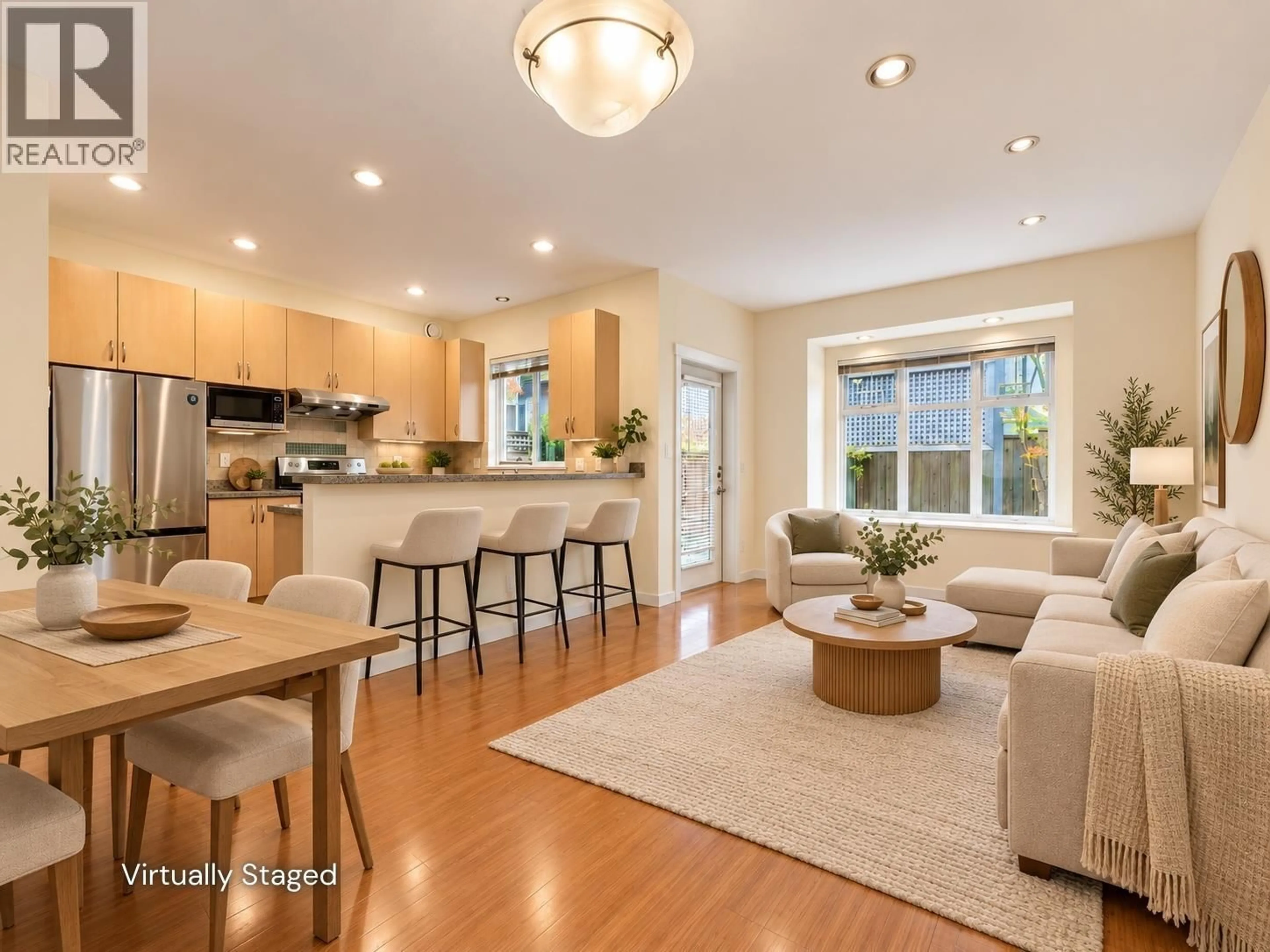 Open concept kitchen, wood/laminate floor for 16 - 8600 NO. 3 ROAD, Richmond British Columbia V6Y2E8