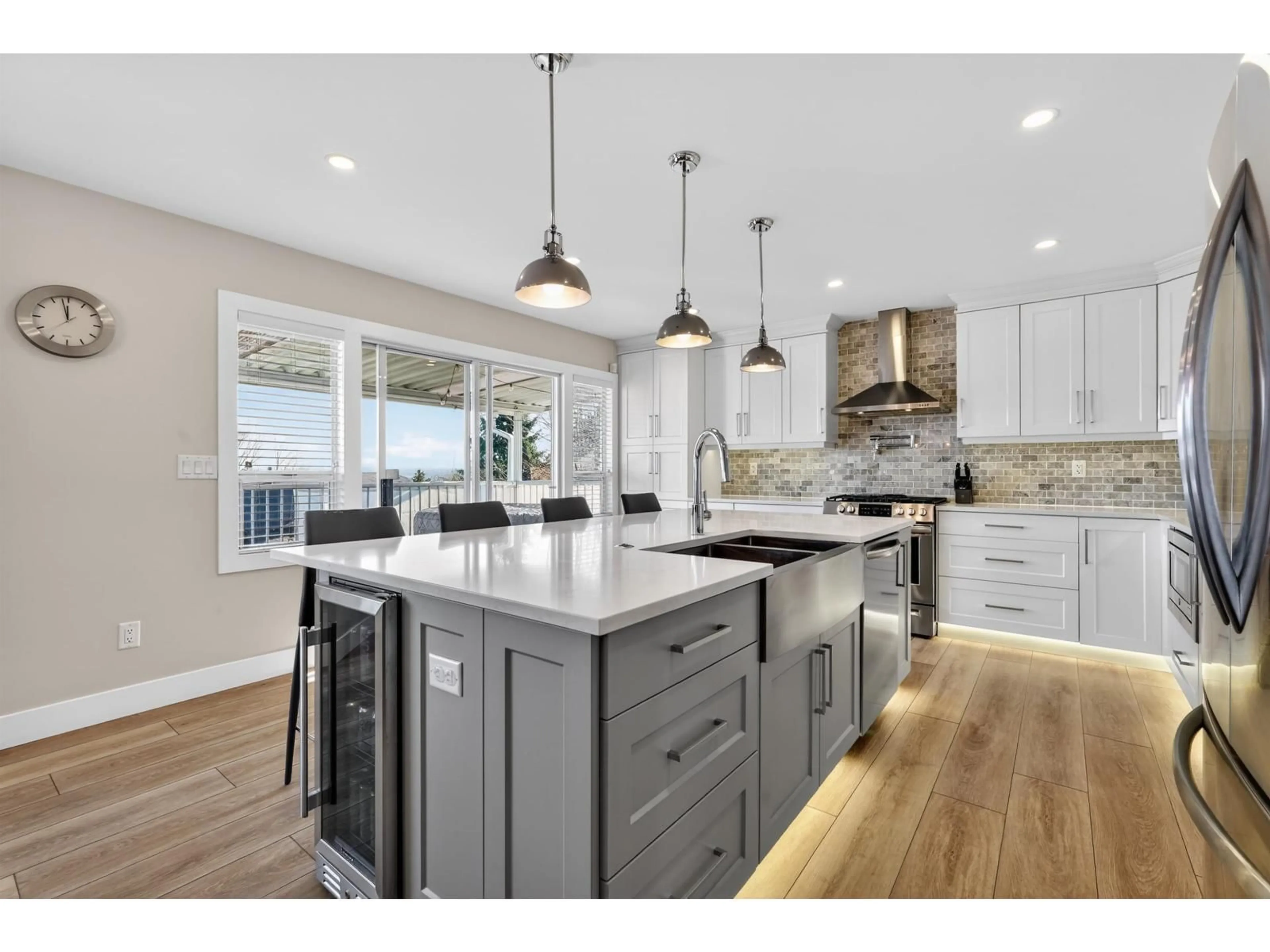 Open concept kitchen, wood/laminate floor for 6260 191A STREET, Surrey British Columbia V3S8C6