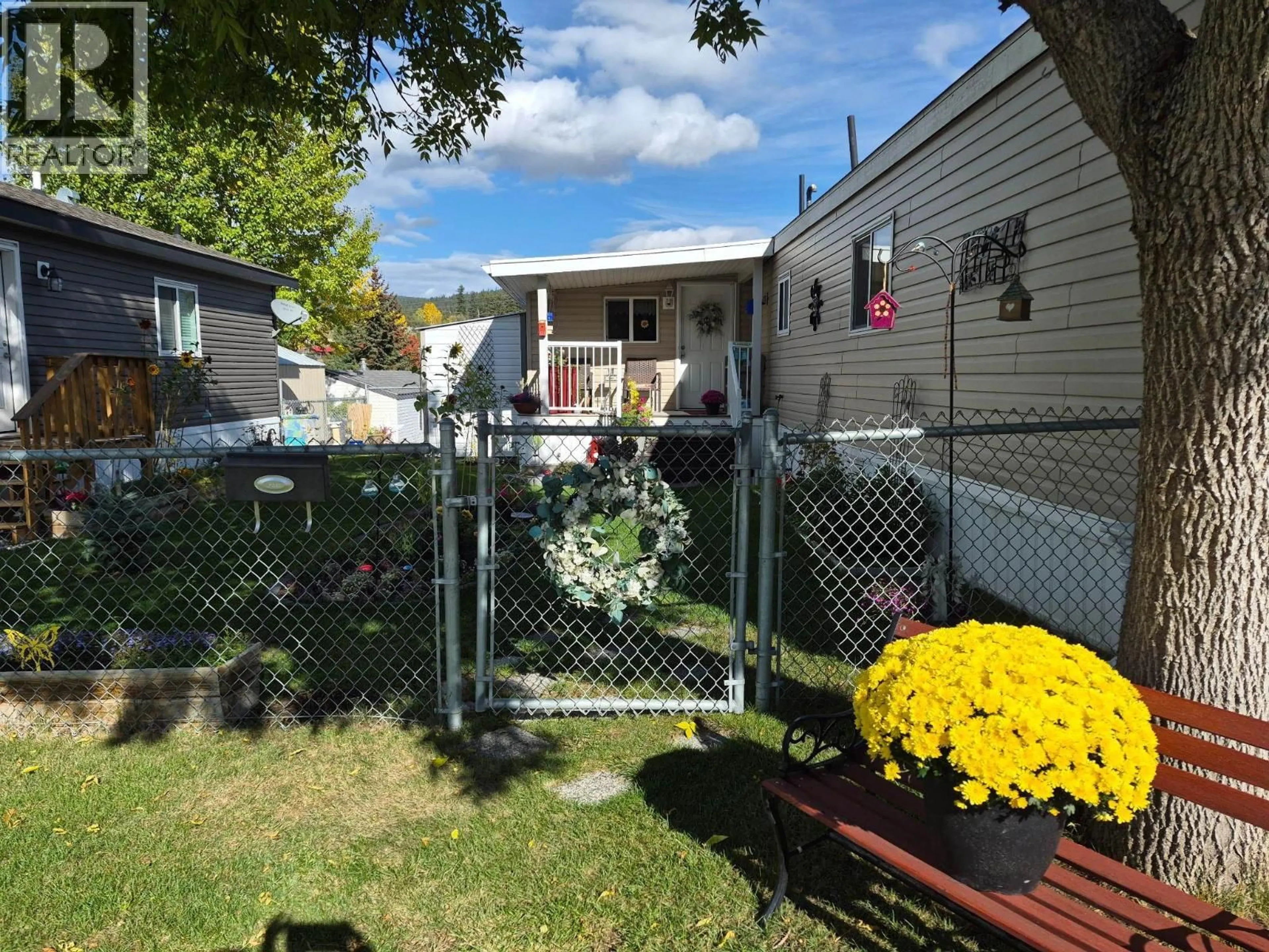 A pic from outside/outdoor area/front of a property/back of a property/a pic from drone, street for 57 - 3001 MACKENZIE AVENUE, Williams Lake British Columbia V2G3N9