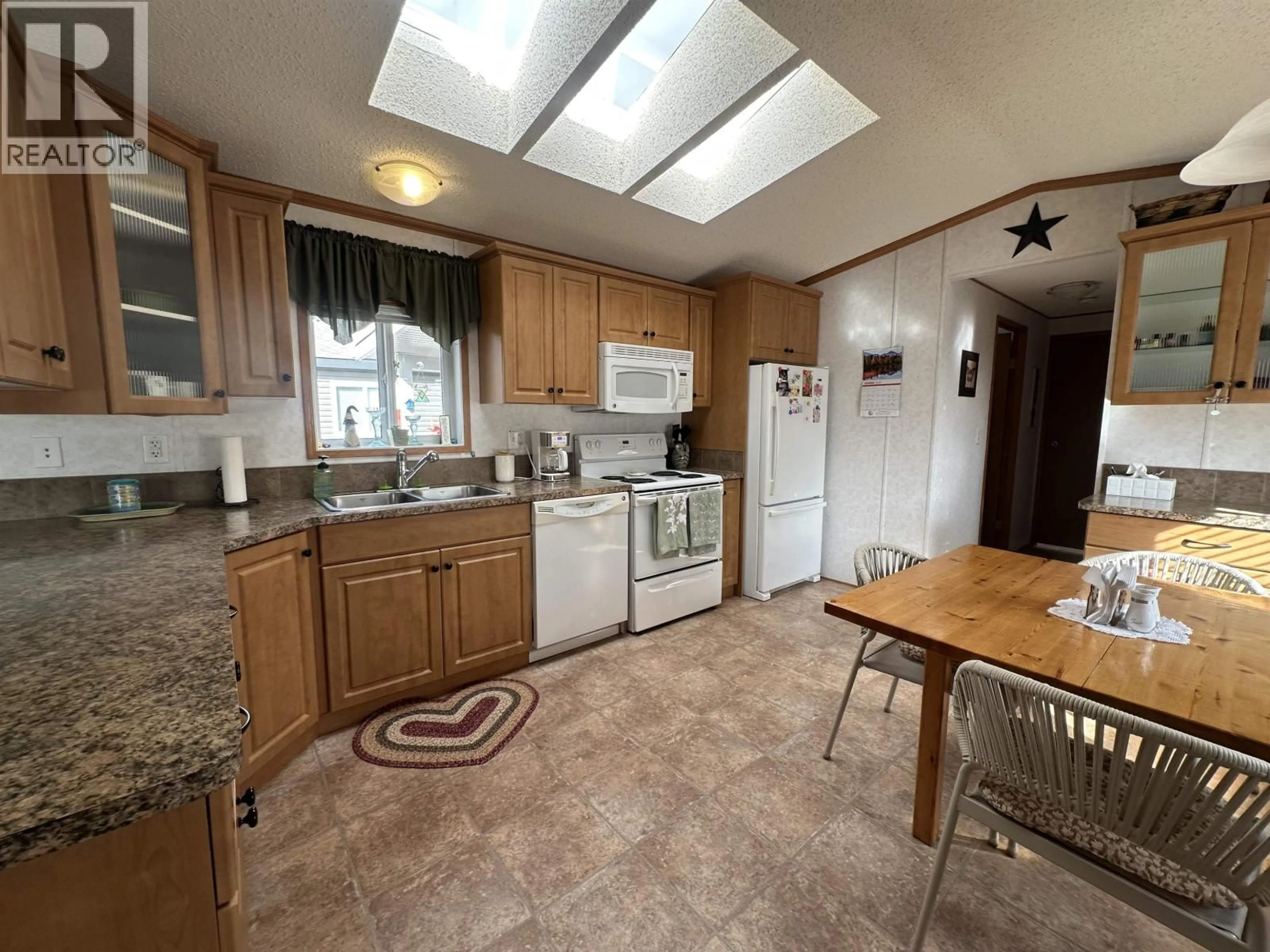 Standard kitchen, ceramic/tile floor for 57 - 3001 MACKENZIE AVENUE, Williams Lake British Columbia V2G3N9
