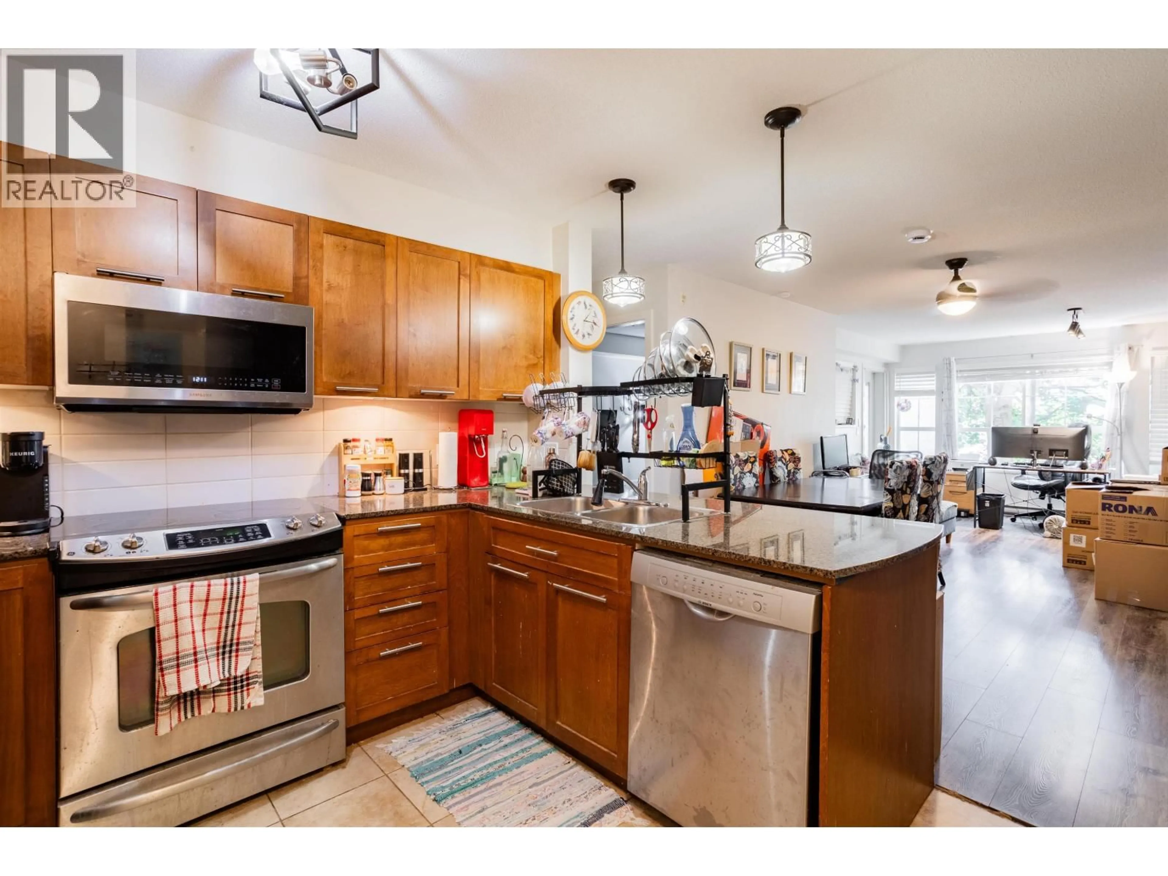 Open concept kitchen, ceramic/tile floor for 117 - 19677 MEADOW GARDENS WAY, Pitt Meadows British Columbia V3Y0A2