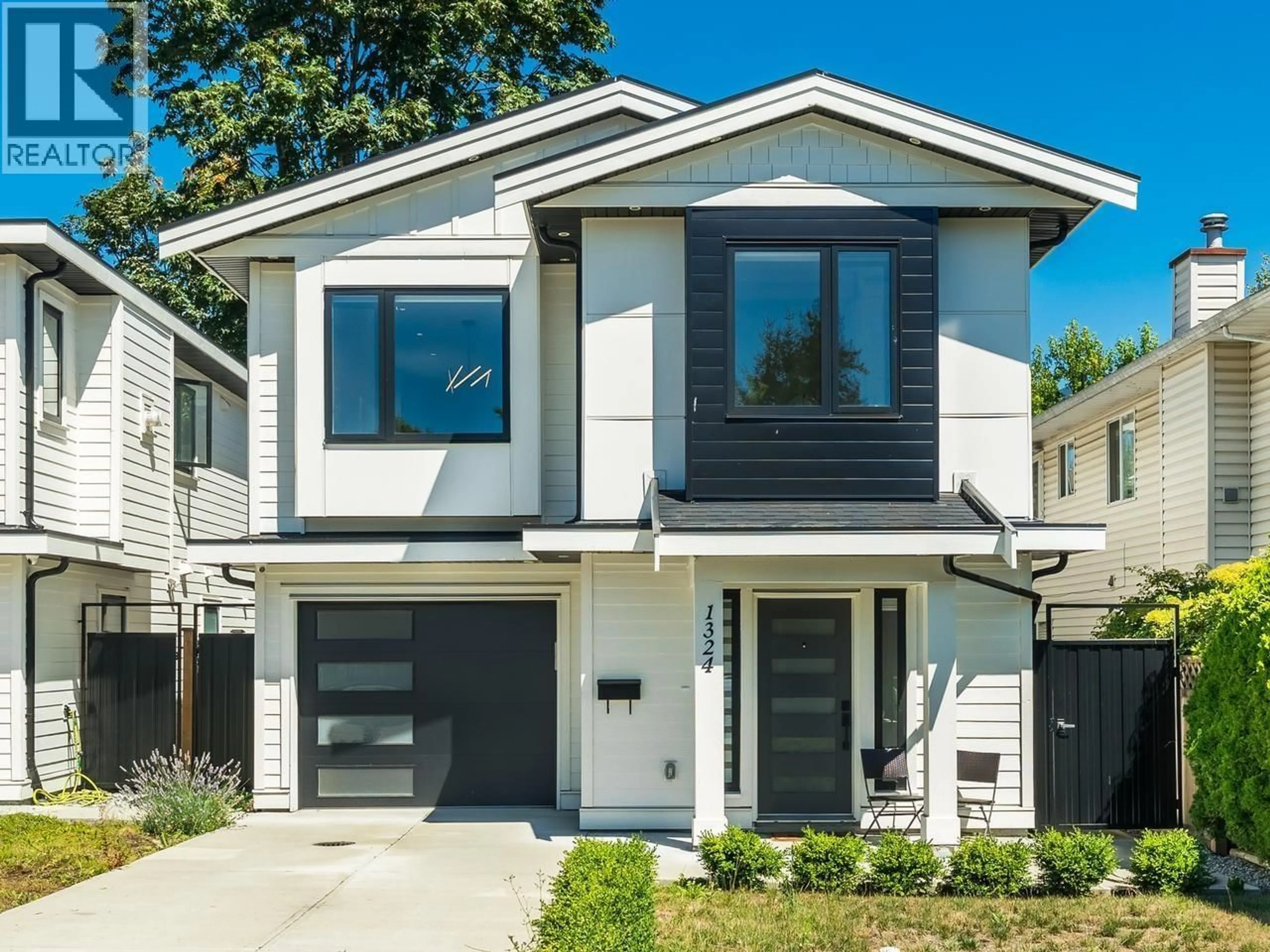 Home with vinyl exterior material, street for 1324 15TH STREET, North Vancouver British Columbia V7P1N2