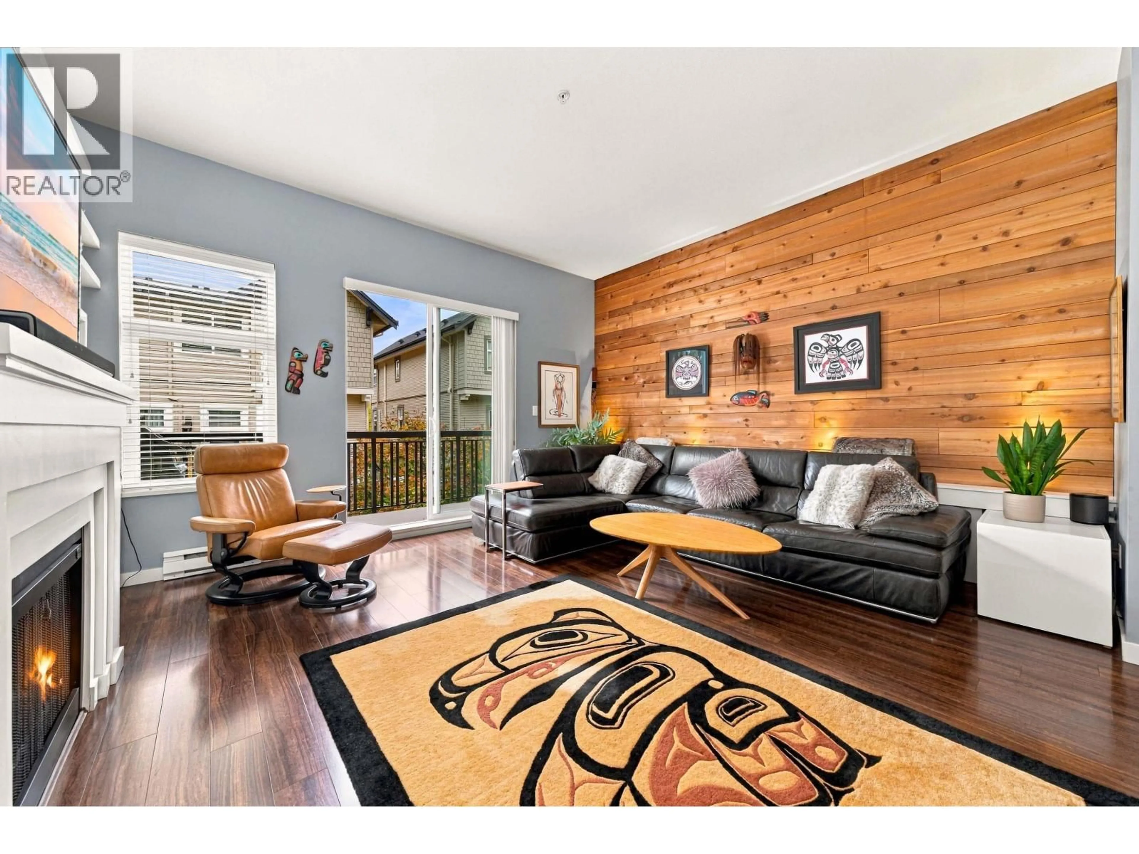 Living room with furniture, wood/laminate floor for 709 PREMIER STREET, North Vancouver British Columbia V7J0A5