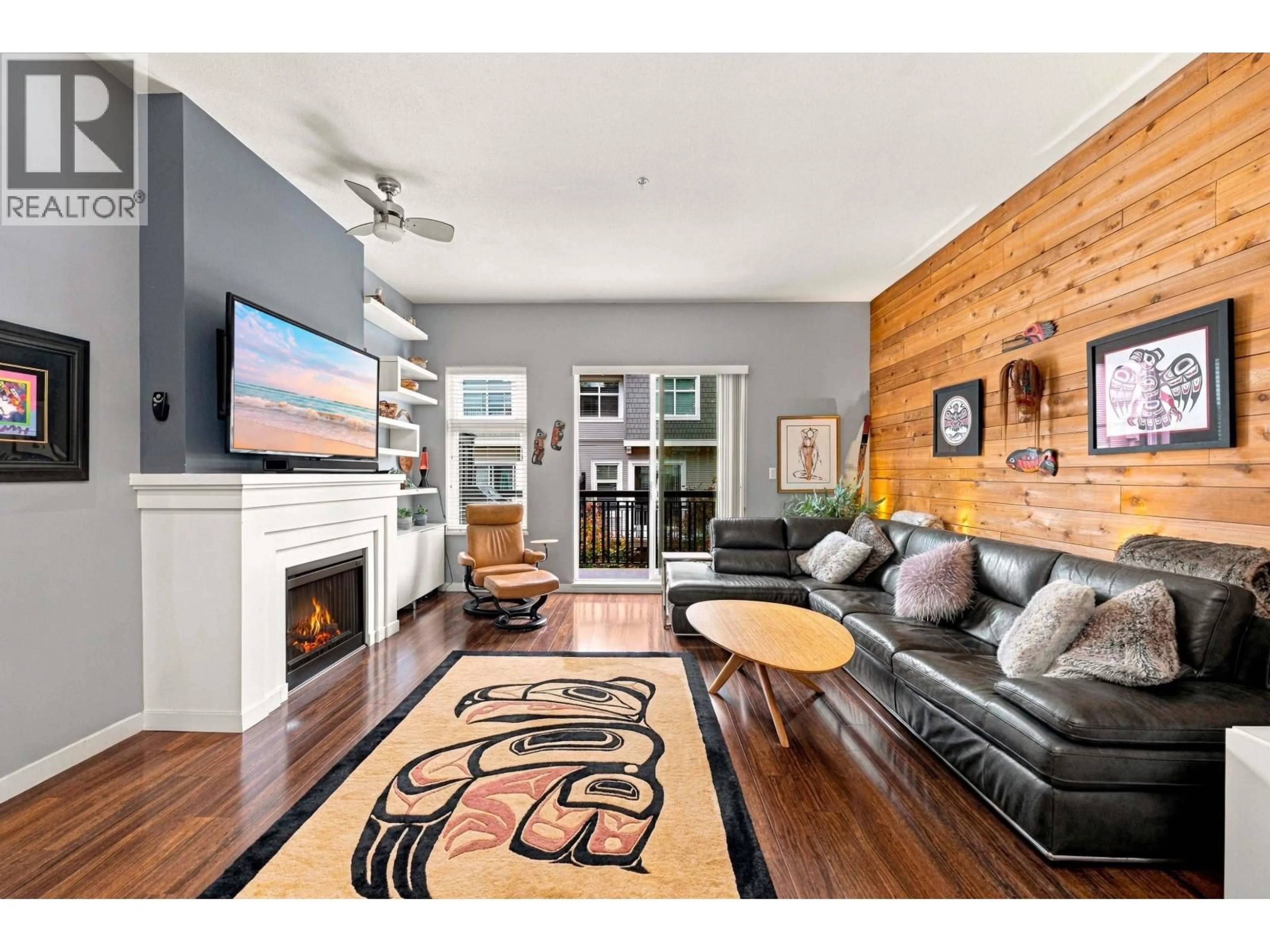Living room with furniture, wood/laminate floor for 709 PREMIER STREET, North Vancouver British Columbia V7J0A5