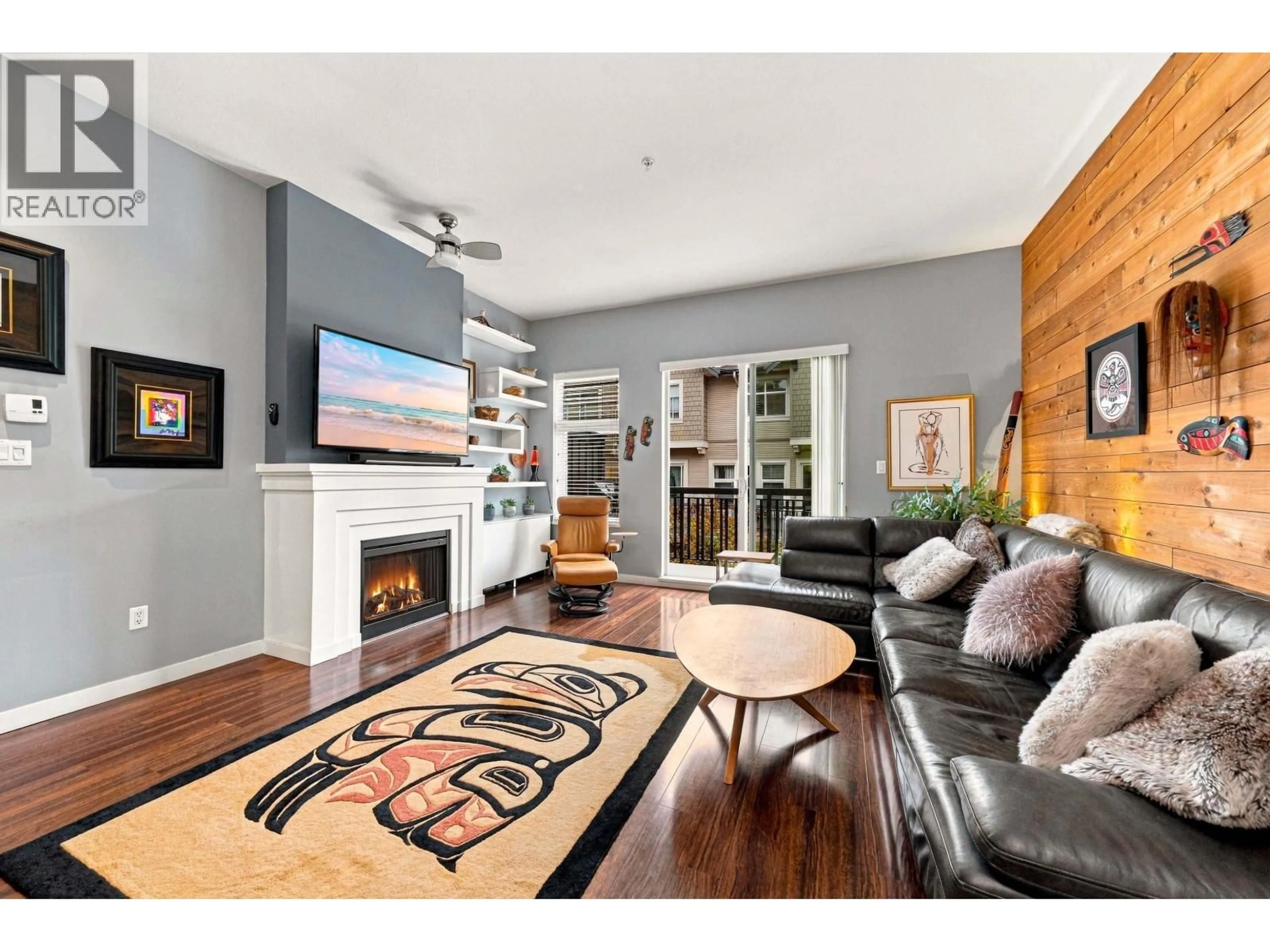 Living room with furniture, wood/laminate floor for 709 PREMIER STREET, North Vancouver British Columbia V7J0A5