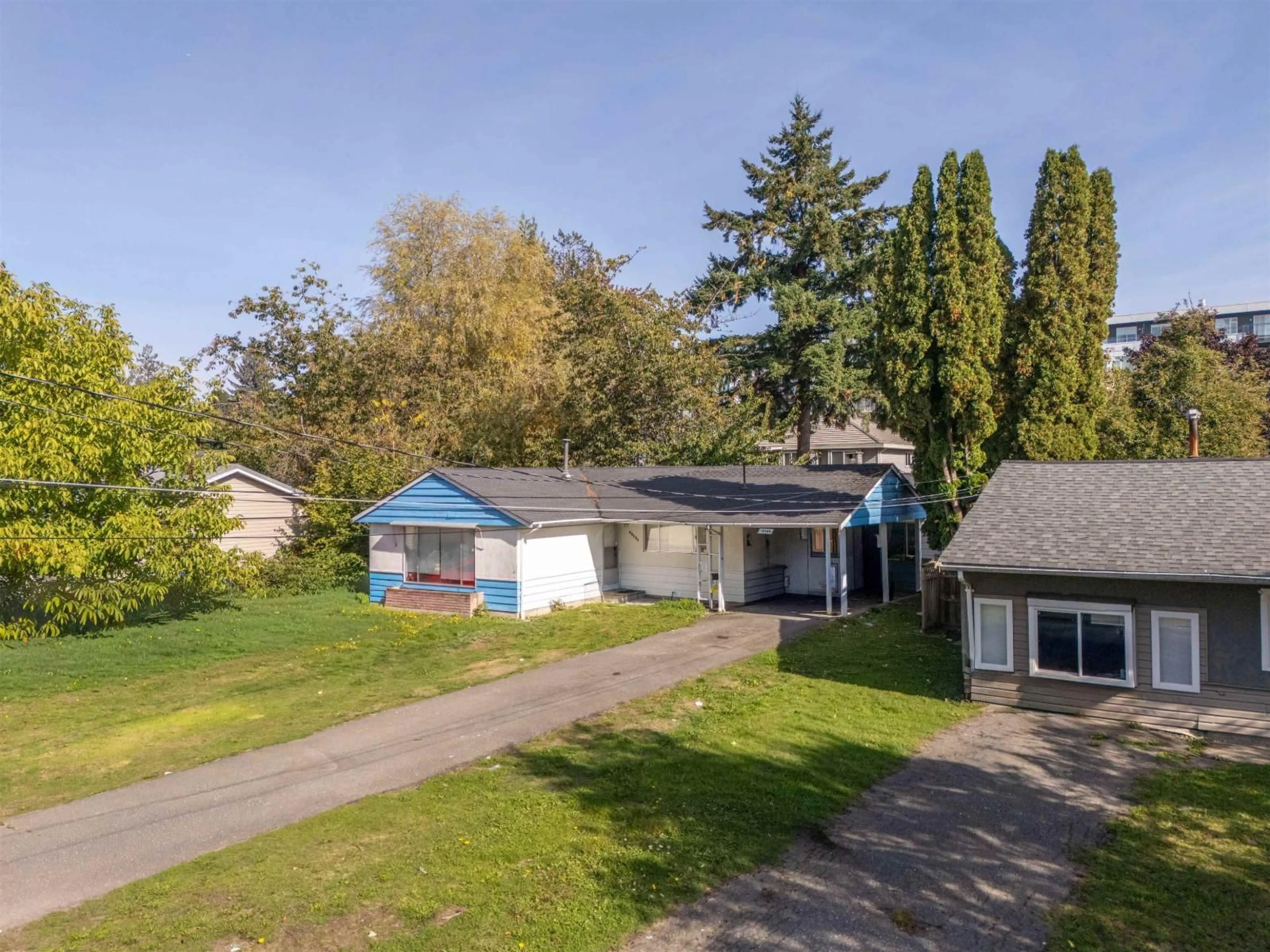 A pic from outside/outdoor area/front of a property/back of a property/a pic from drone, street for 10468 138 STREET, Surrey British Columbia V3T4K3