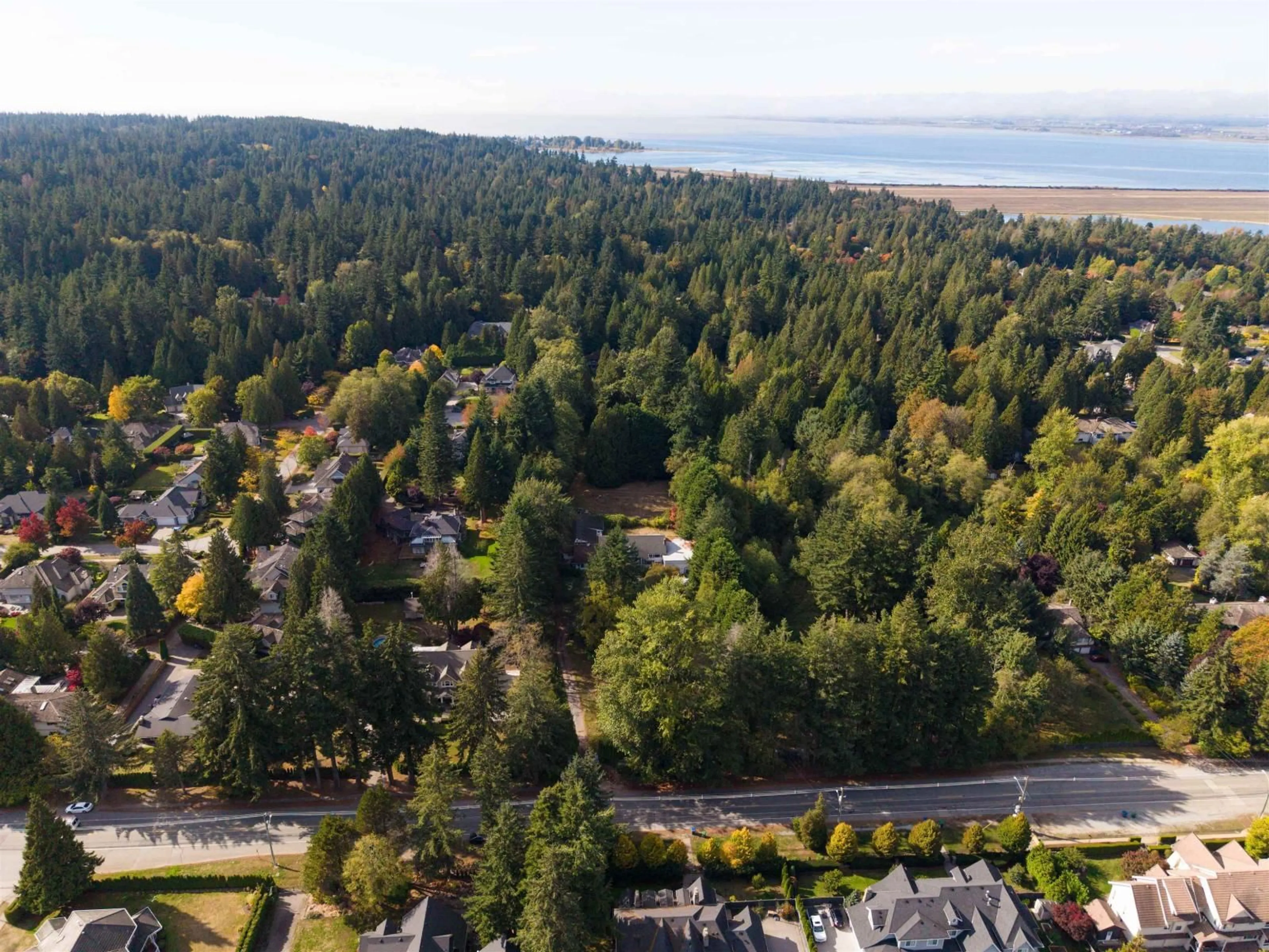 A pic from outside/outdoor area/front of a property/back of a property/a pic from drone, water/lake/river/ocean view for 3055 140 STREET, Surrey British Columbia V4P2C2