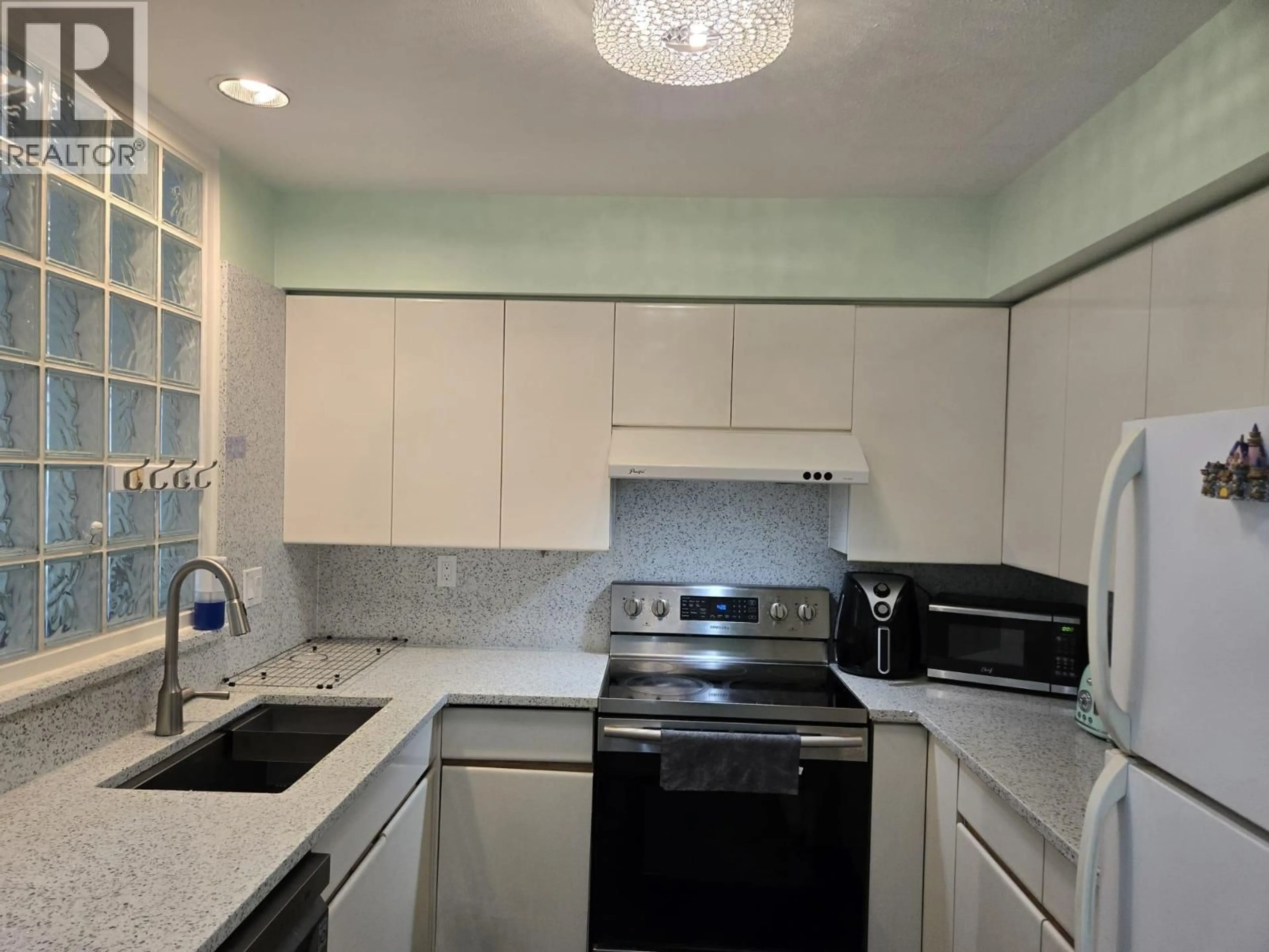 Standard kitchen, ceramic/tile floor for 11 - 6391 COONEY ROAD, Richmond British Columbia V6Y2J5