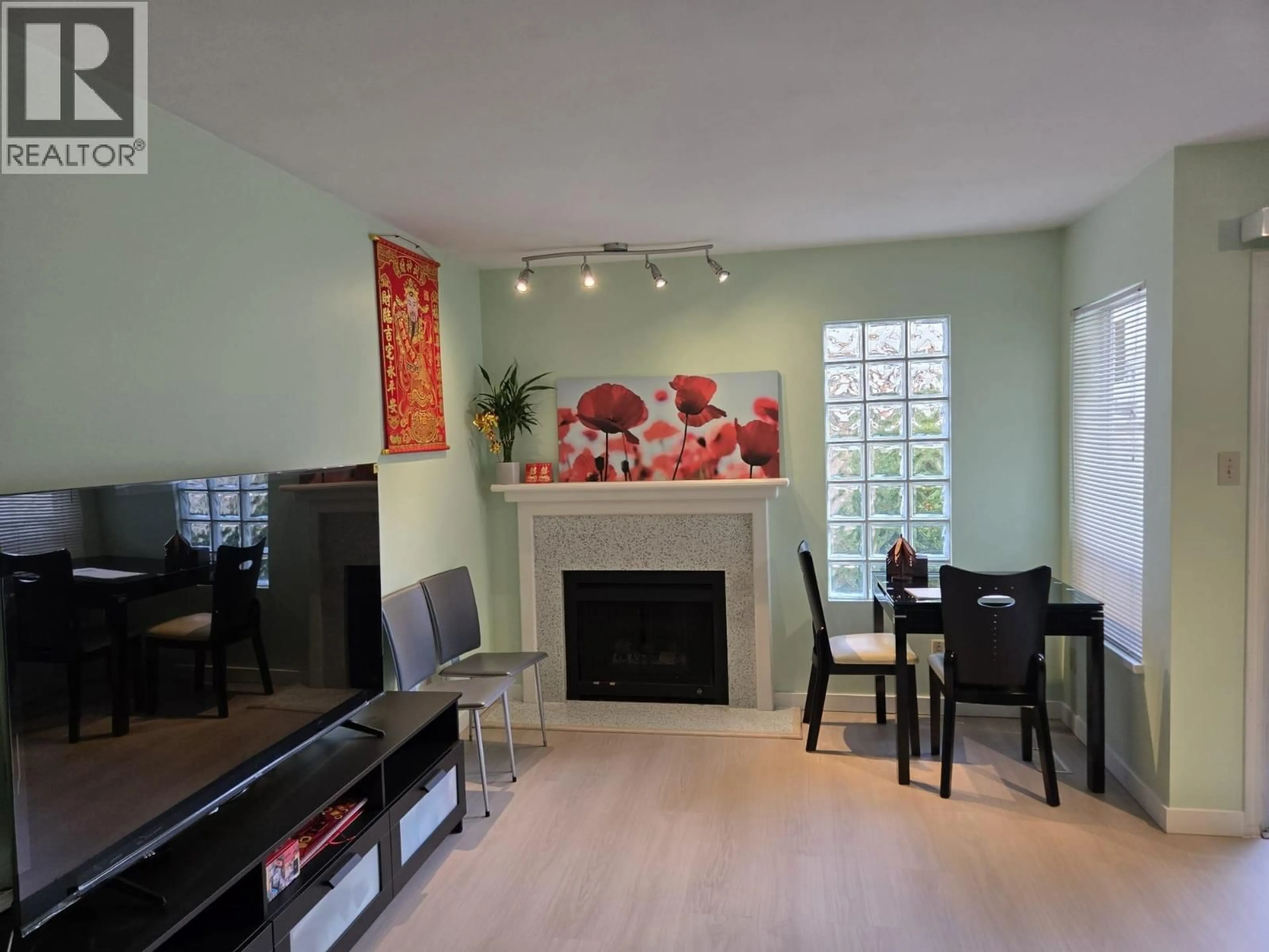 Living room with furniture, unknown for 11 - 6391 COONEY ROAD, Richmond British Columbia V6Y2J5