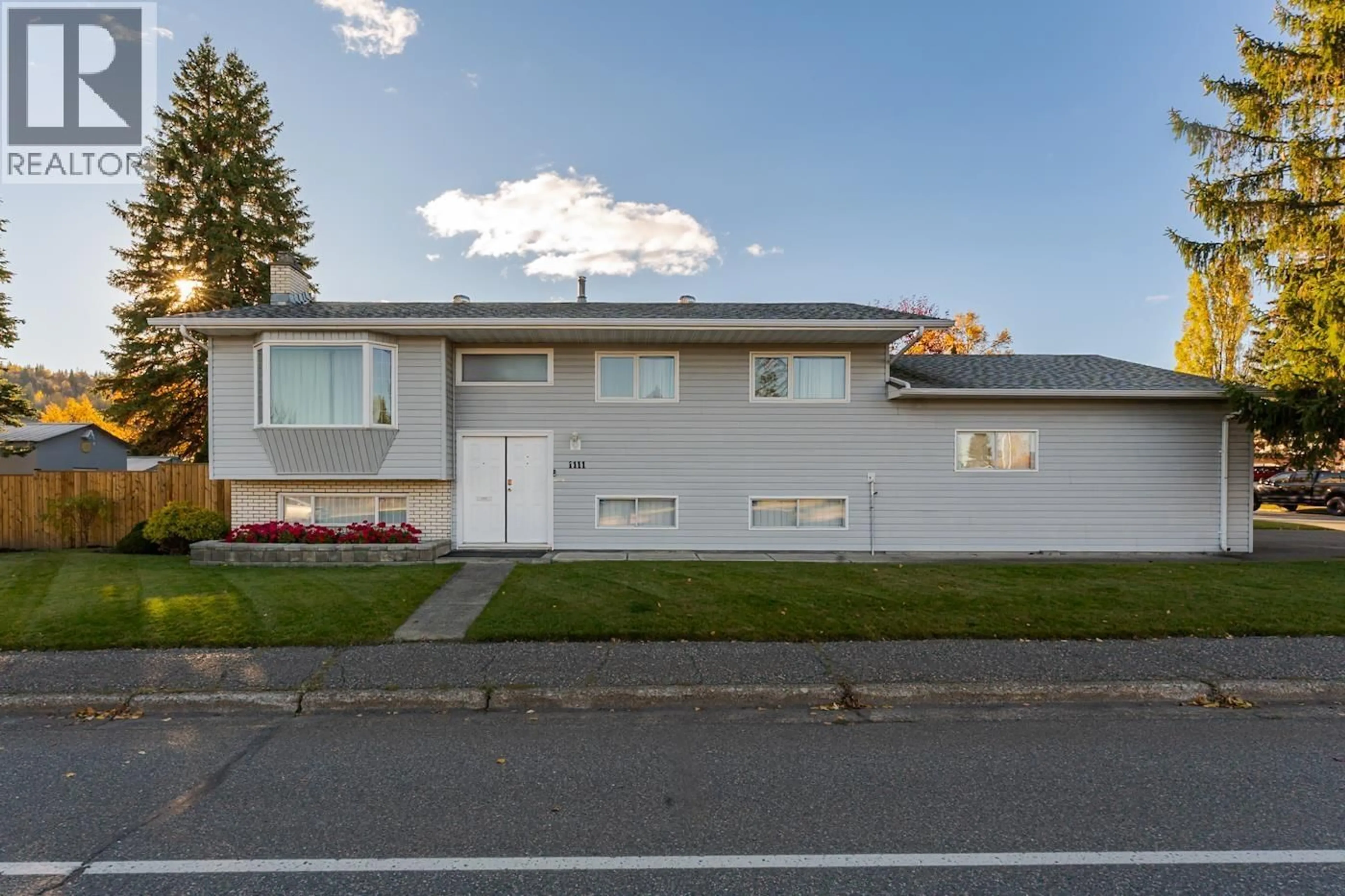 Home with vinyl exterior material, street for 1111 TABOR BOULEVARD, Prince George British Columbia V2M4X3