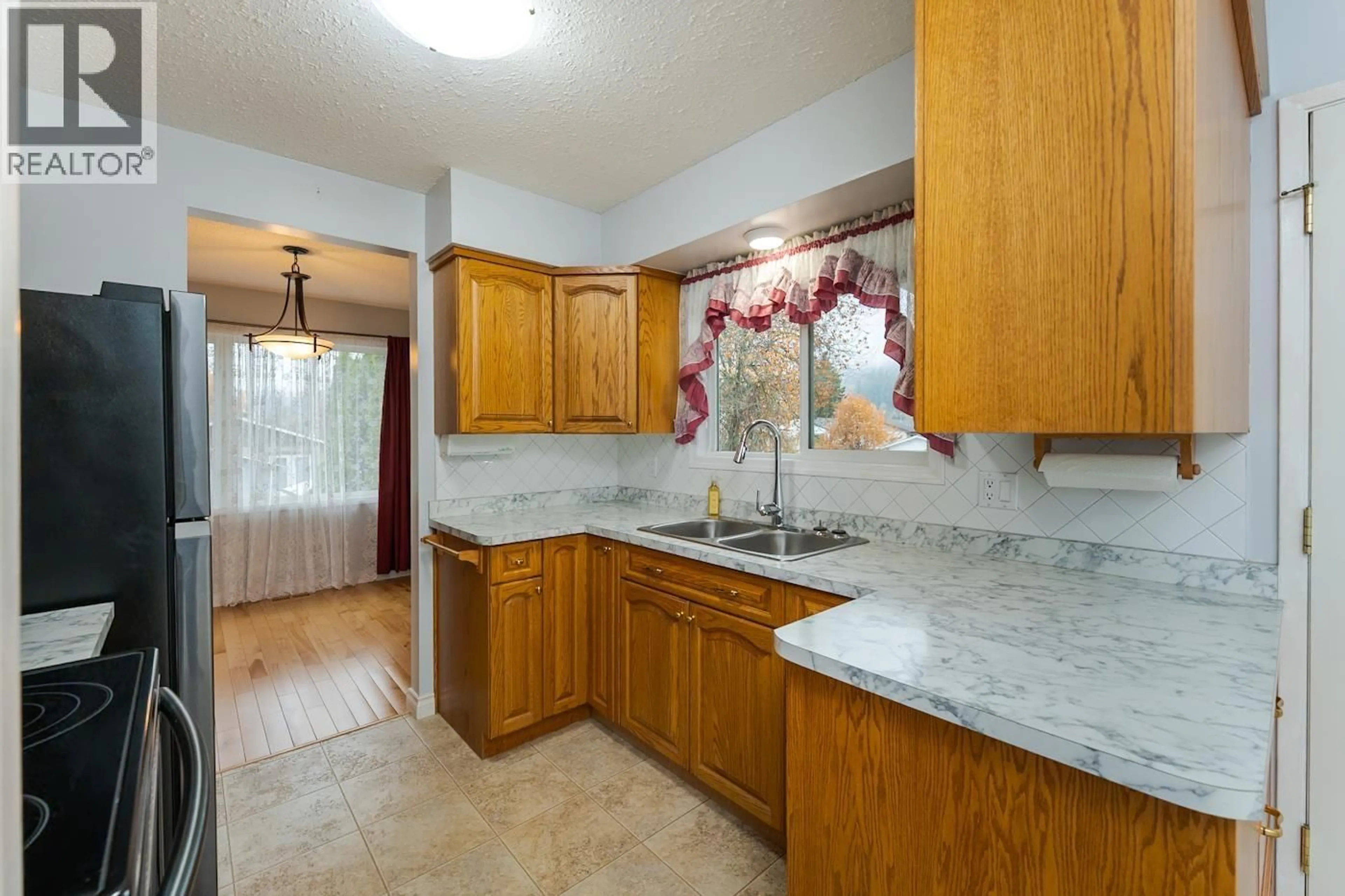 Standard kitchen, ceramic/tile floor for 1111 TABOR BOULEVARD, Prince George British Columbia V2M4X3