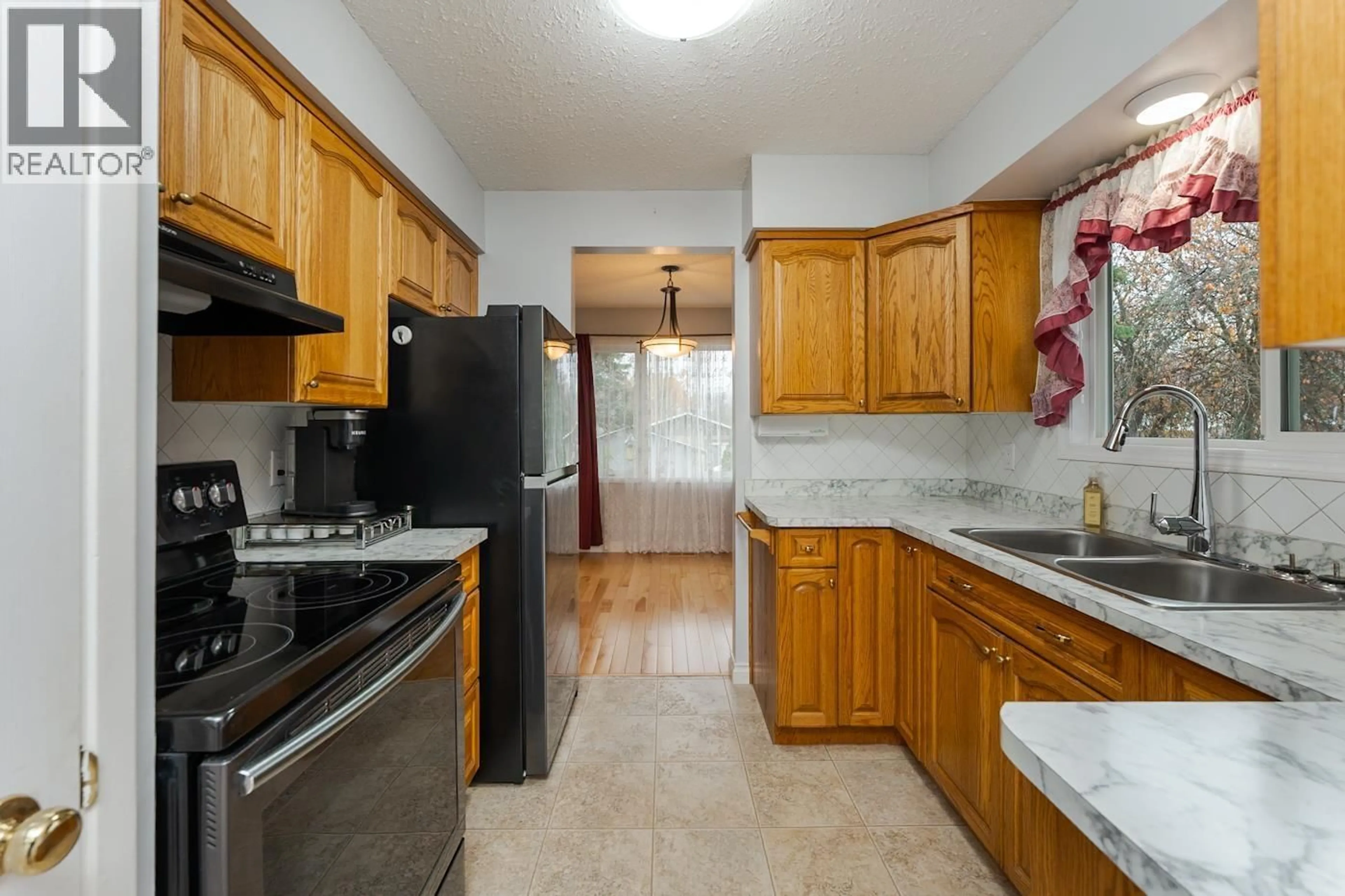 Standard kitchen, ceramic/tile floor for 1111 TABOR BOULEVARD, Prince George British Columbia V2M4X3