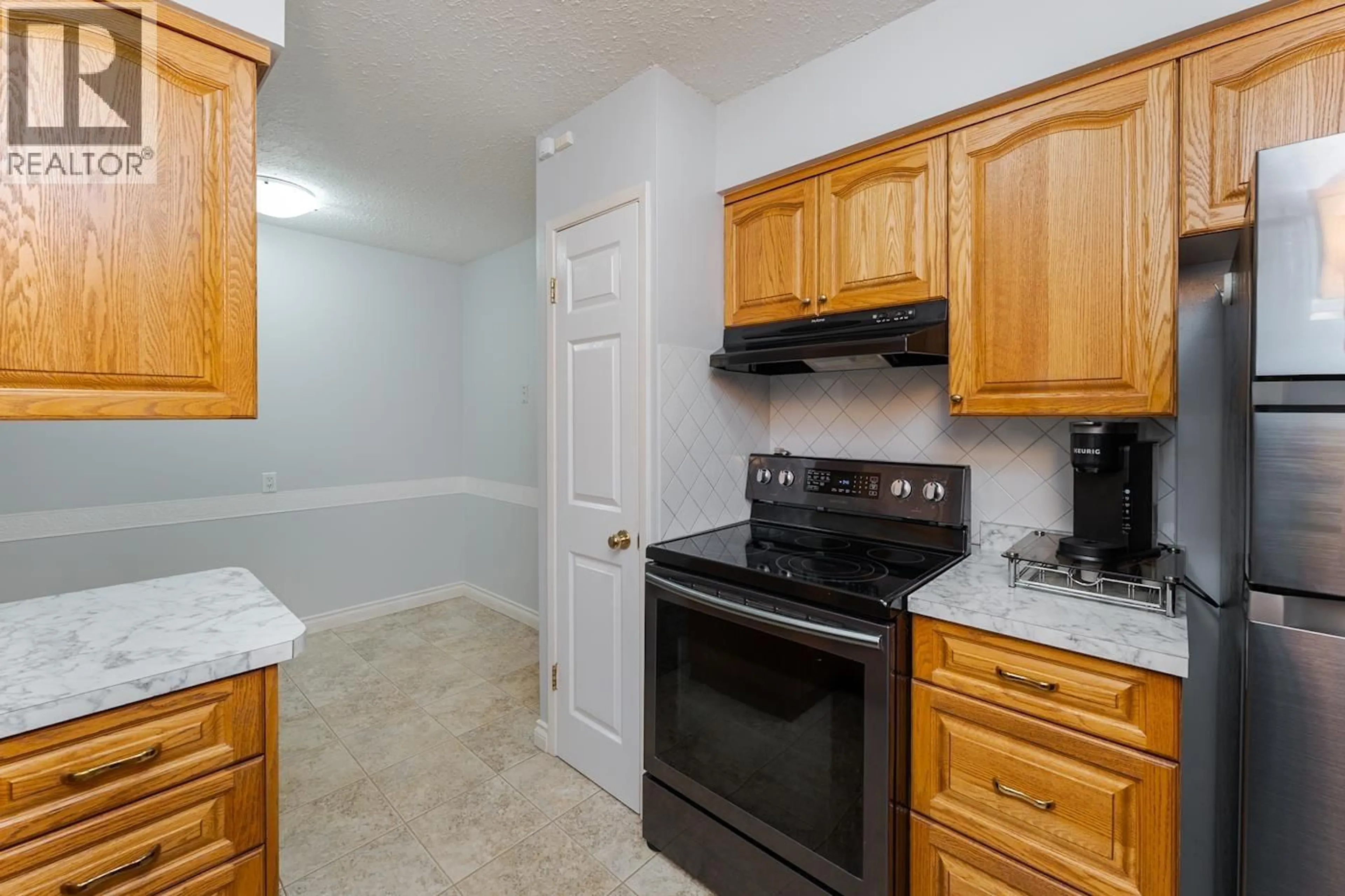 Standard kitchen, unknown for 1111 TABOR BOULEVARD, Prince George British Columbia V2M4X3