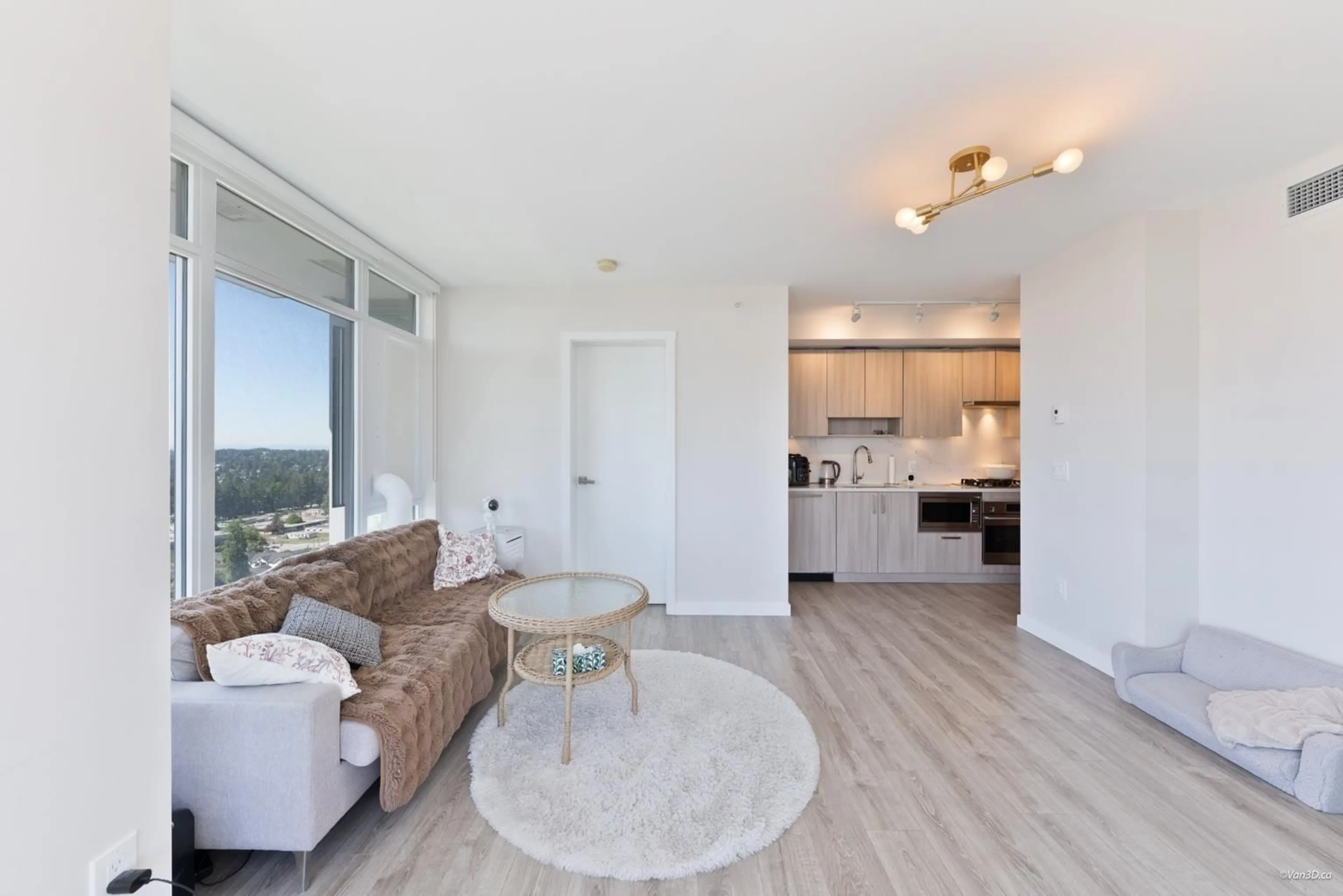 Living room with furniture, wood/laminate floor for 2508 - 13350 CENTRAL AVENUE, Surrey British Columbia V3T0S1