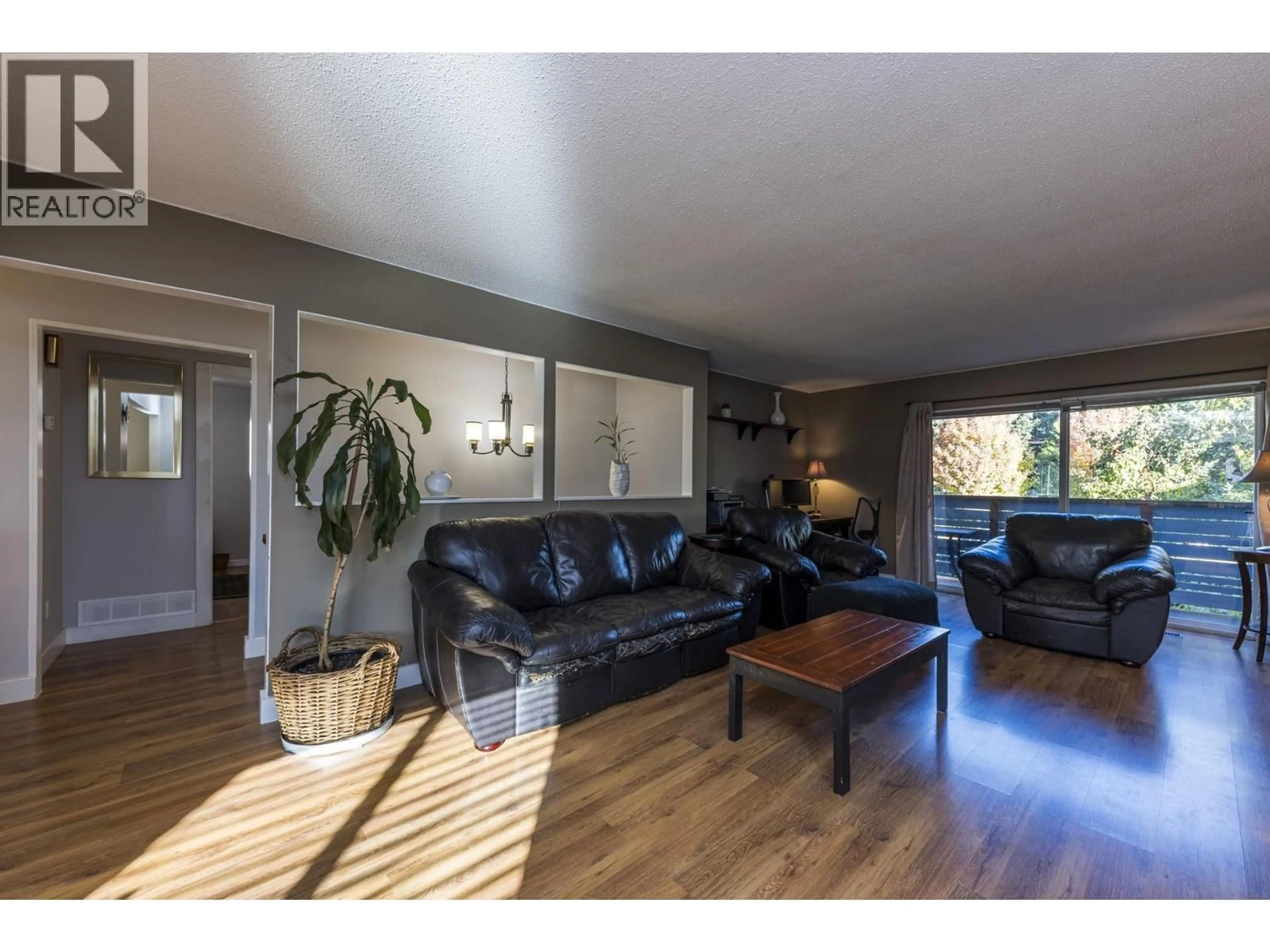 Living room with furniture, wood/laminate floor for 741 18TH STREET, North Vancouver British Columbia V7L2Y7