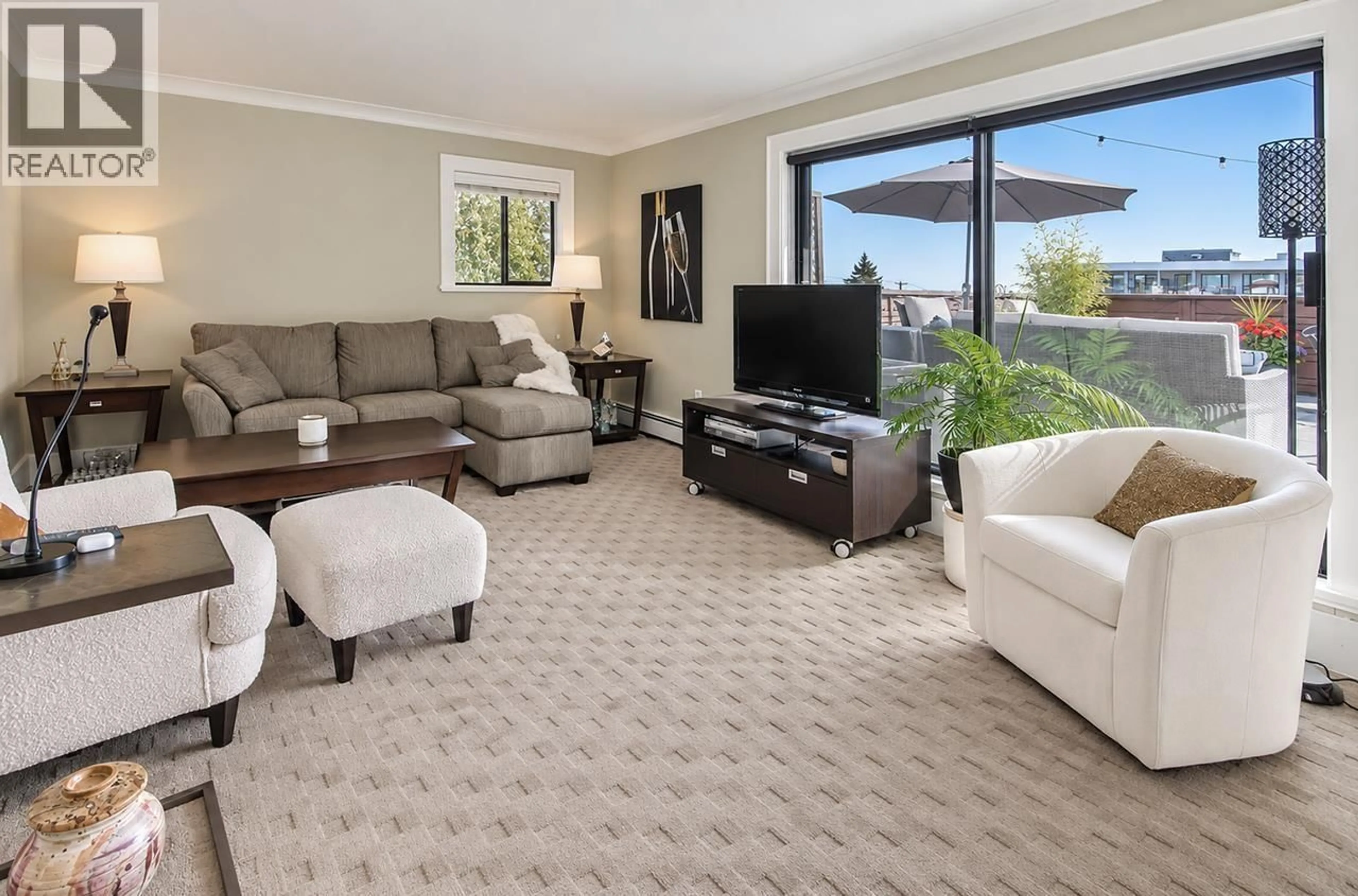 Living room with furniture, carpet floor for 404 - 360 2ND STREET, North Vancouver British Columbia V7L4N6