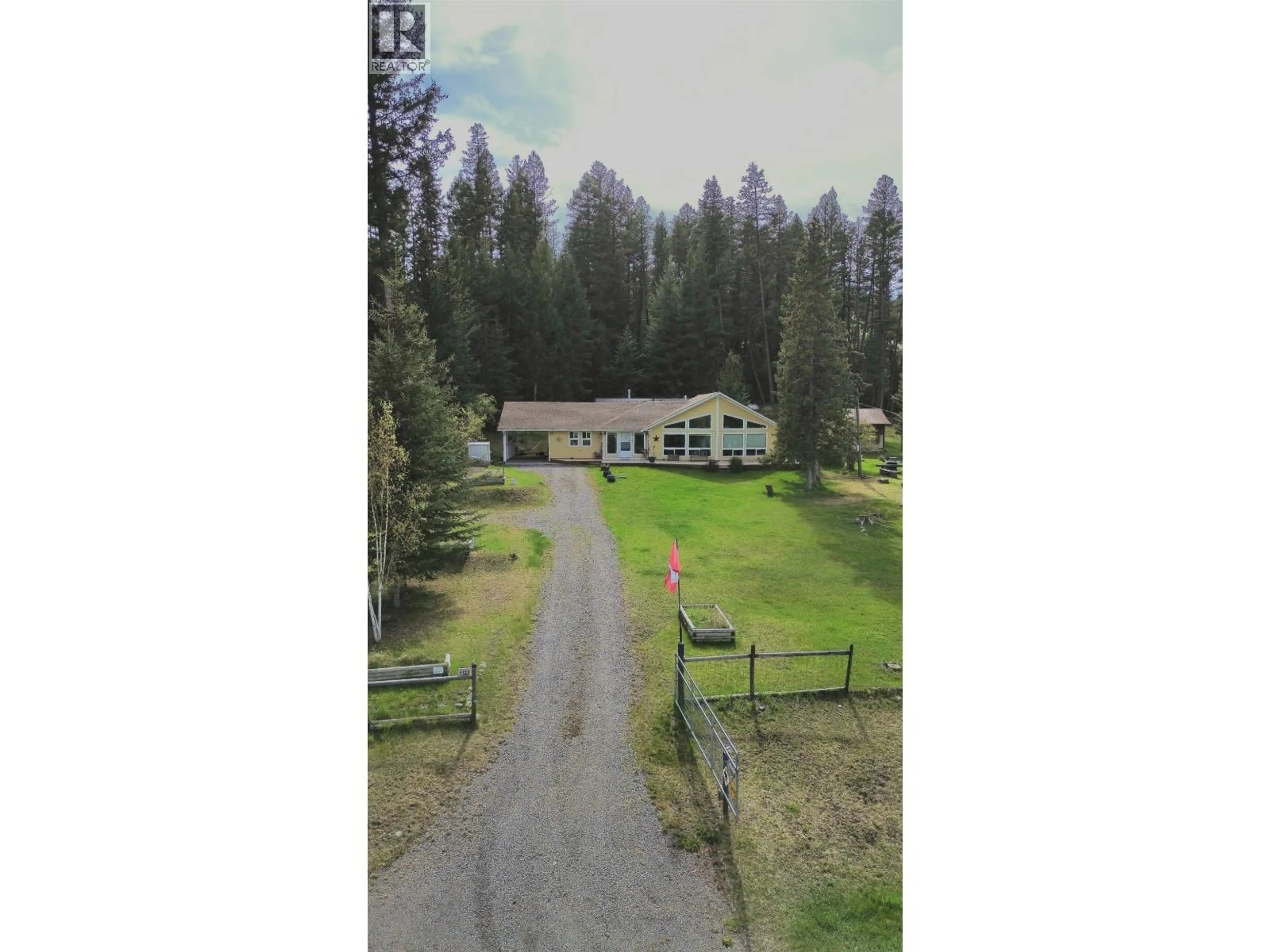 A pic from outside/outdoor area/front of a property/back of a property/a pic from drone, mountain view for 5328 KALLUM DRIVE, 108 Mile Ranch British Columbia V0K2Z0