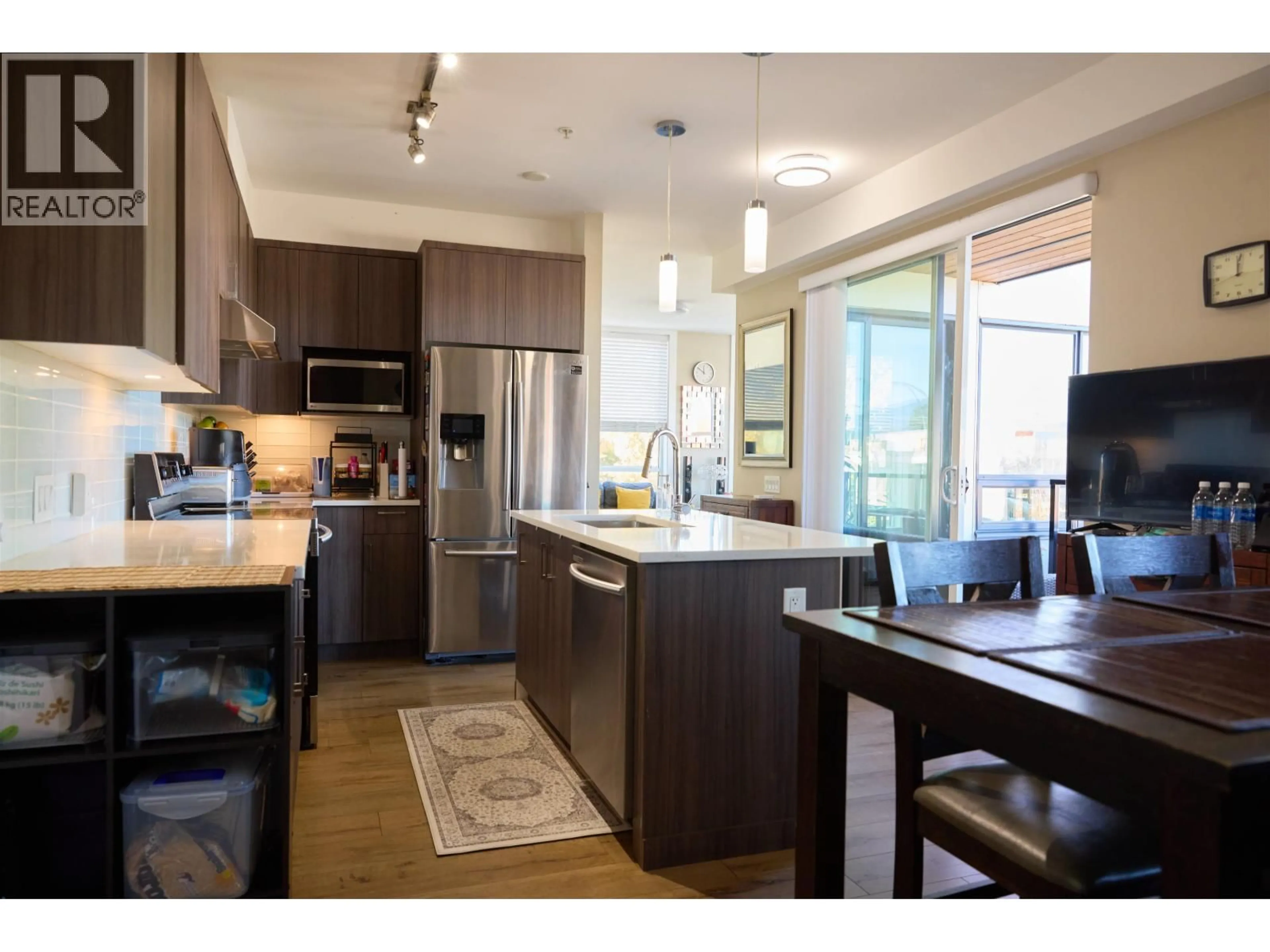 Open concept kitchen, wood/laminate floor for 220 - 12460 191 STREET, Pitt Meadows British Columbia V3Y2J2