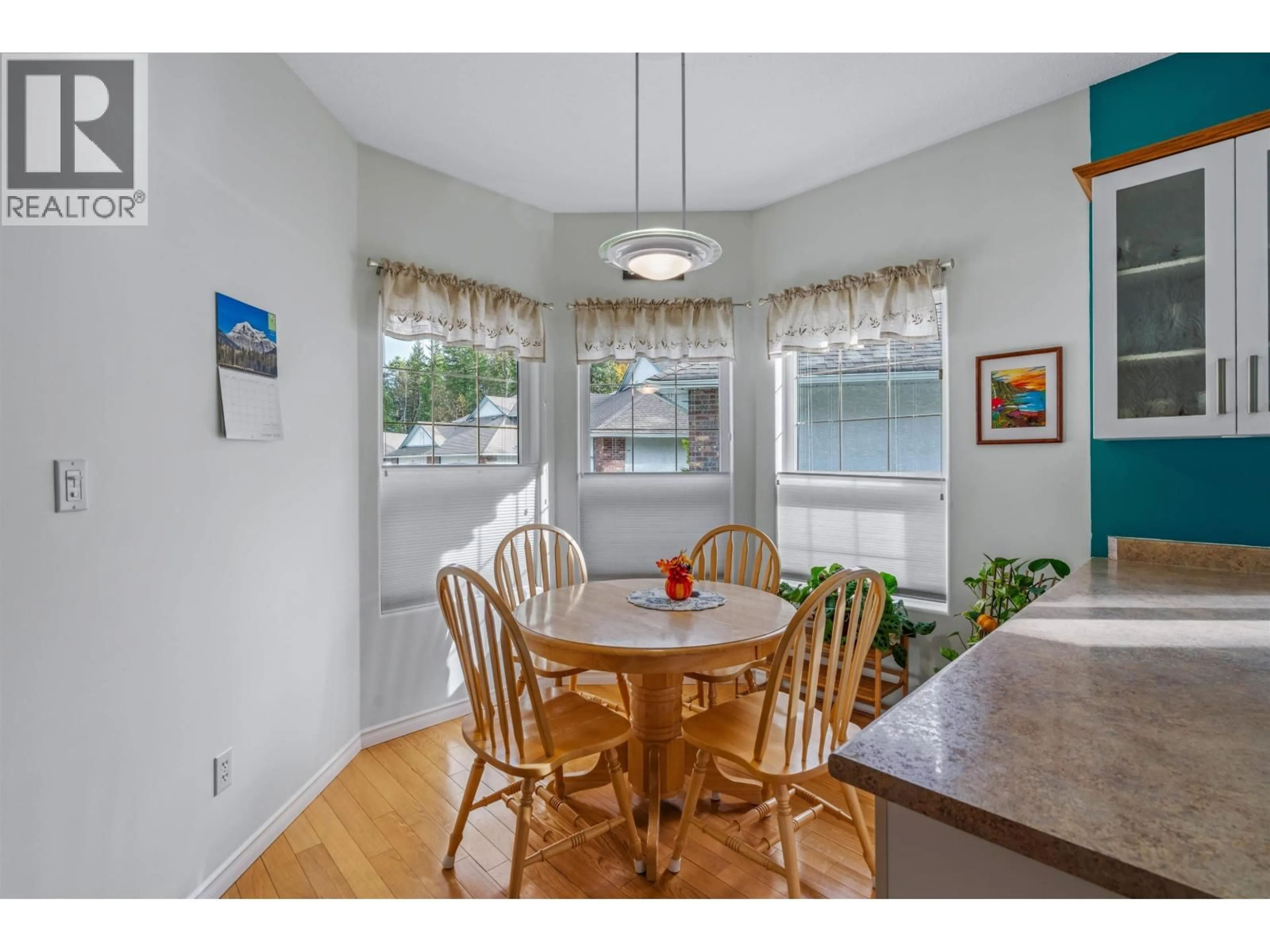 Dining room, wood/laminate floor for 105 - 4450 COWART ROAD, Prince George British Columbia V2N4Z5