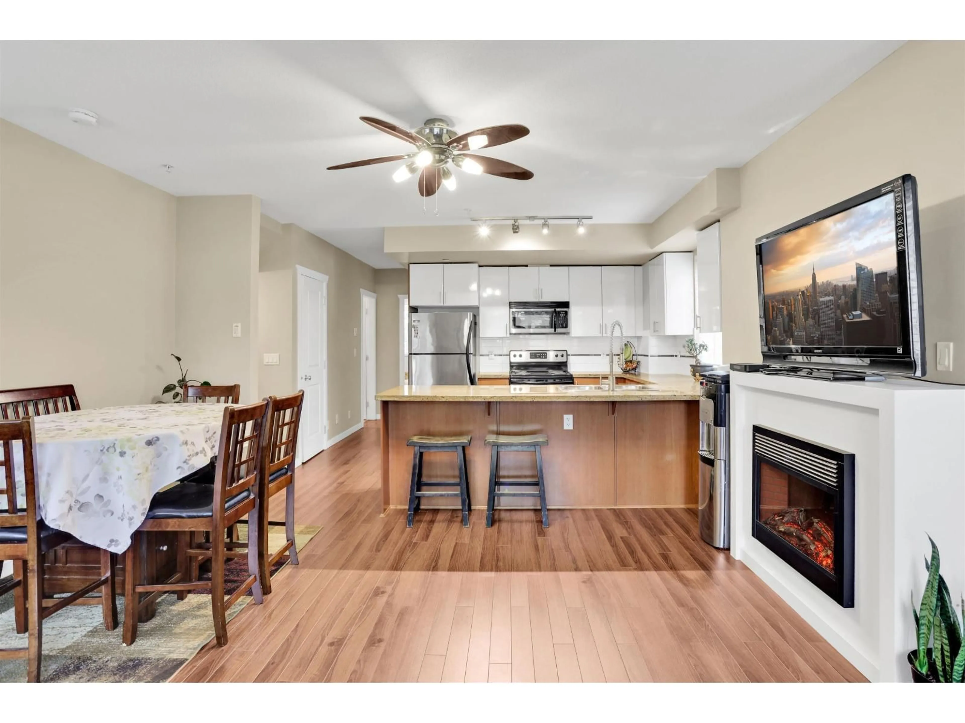 Open concept kitchen, wood/laminate floor for 40 - 13239 OLD YALE ROAD, Surrey British Columbia V3T3C5
