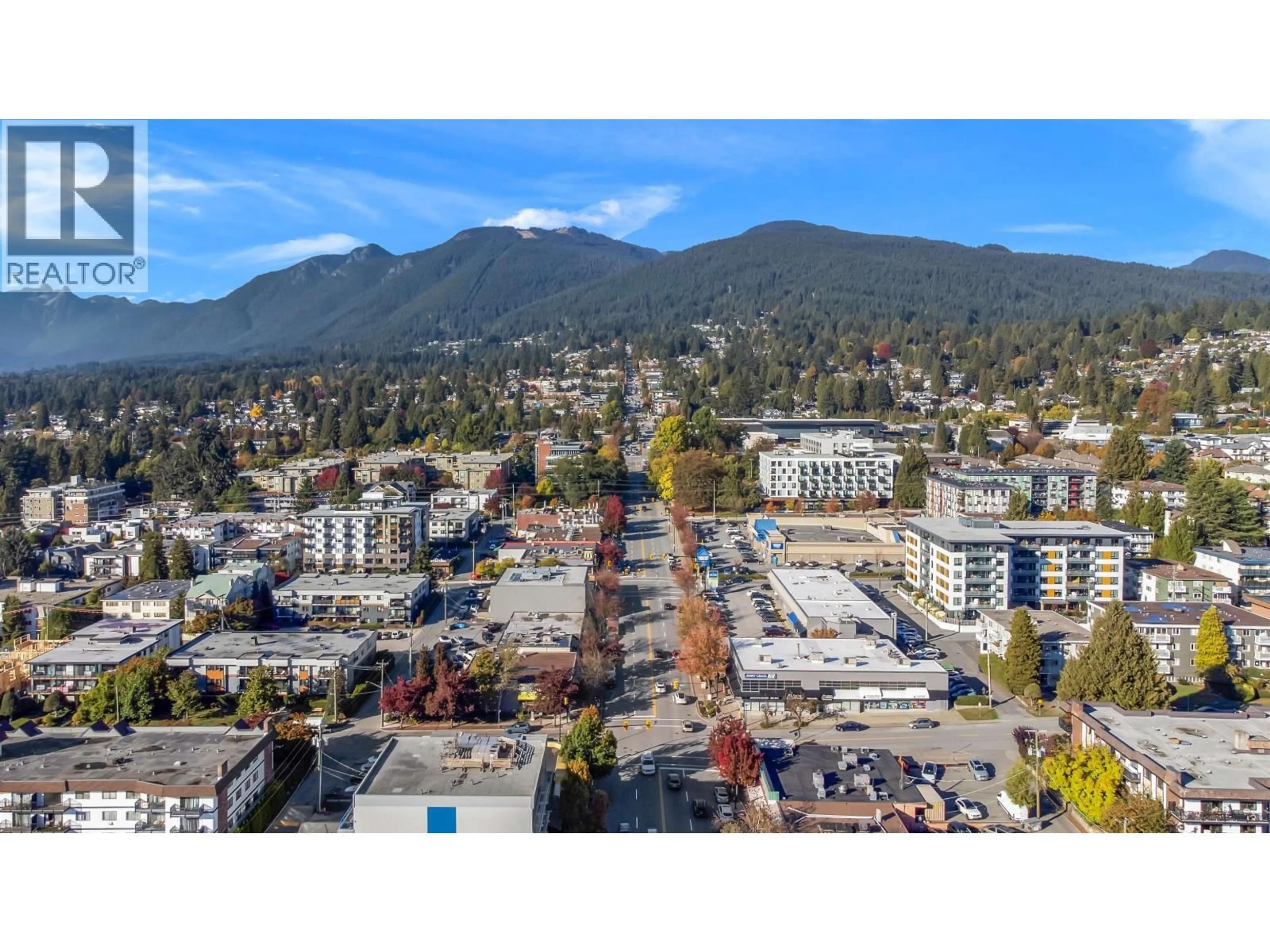A pic from outside/outdoor area/front of a property/back of a property/a pic from drone, mountain view for 304 - 120 17TH STREET, North Vancouver British Columbia V7M1V4
