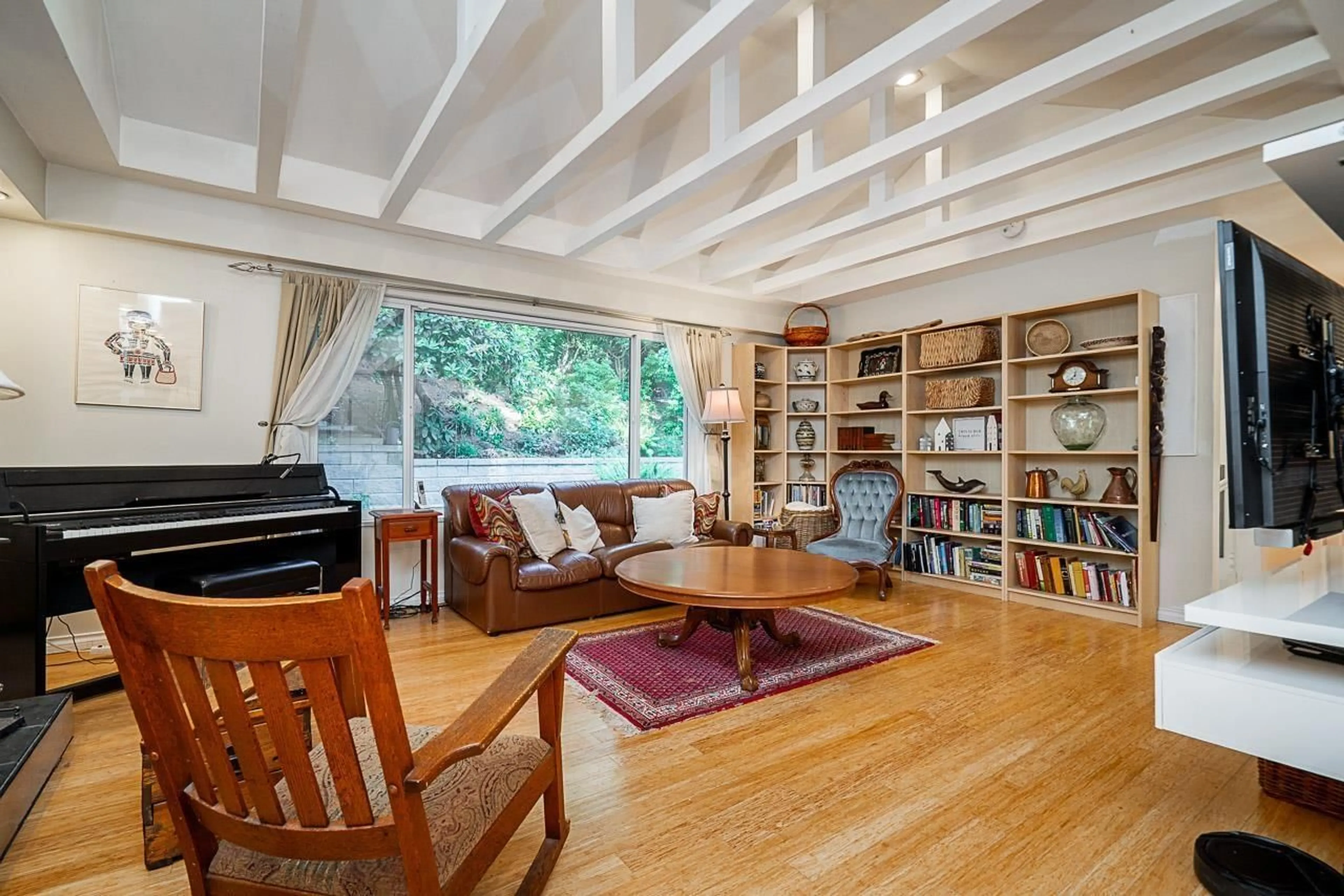 Living room with furniture, wood/laminate floor for 7397 BATES ROAD, Delta British Columbia V4C6X2