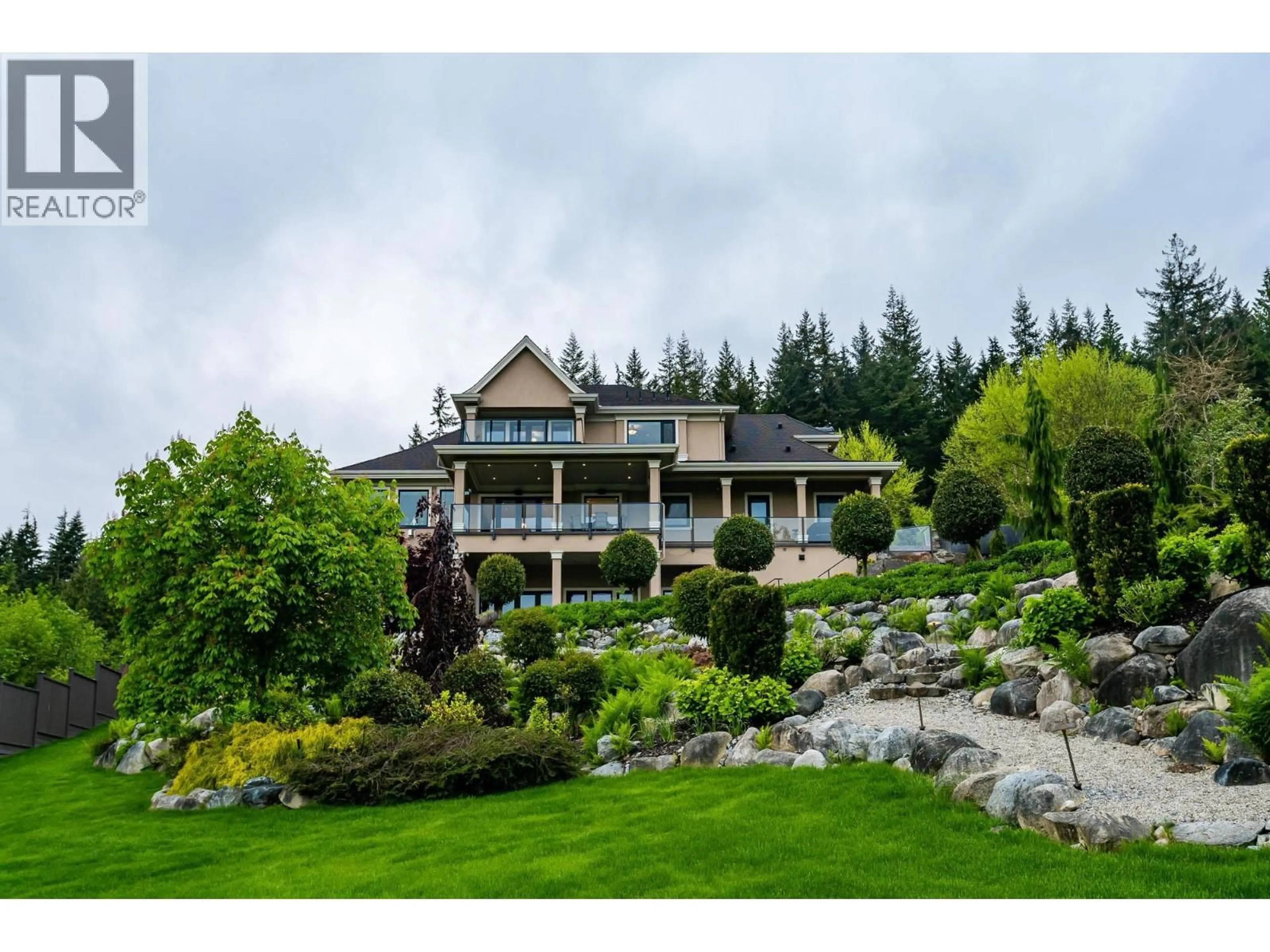 A pic from outside/outdoor area/front of a property/back of a property/a pic from drone, water/lake/river/ocean view for 2057 RIDGE MOUNTAIN DRIVE, Anmore British Columbia V3H0G7